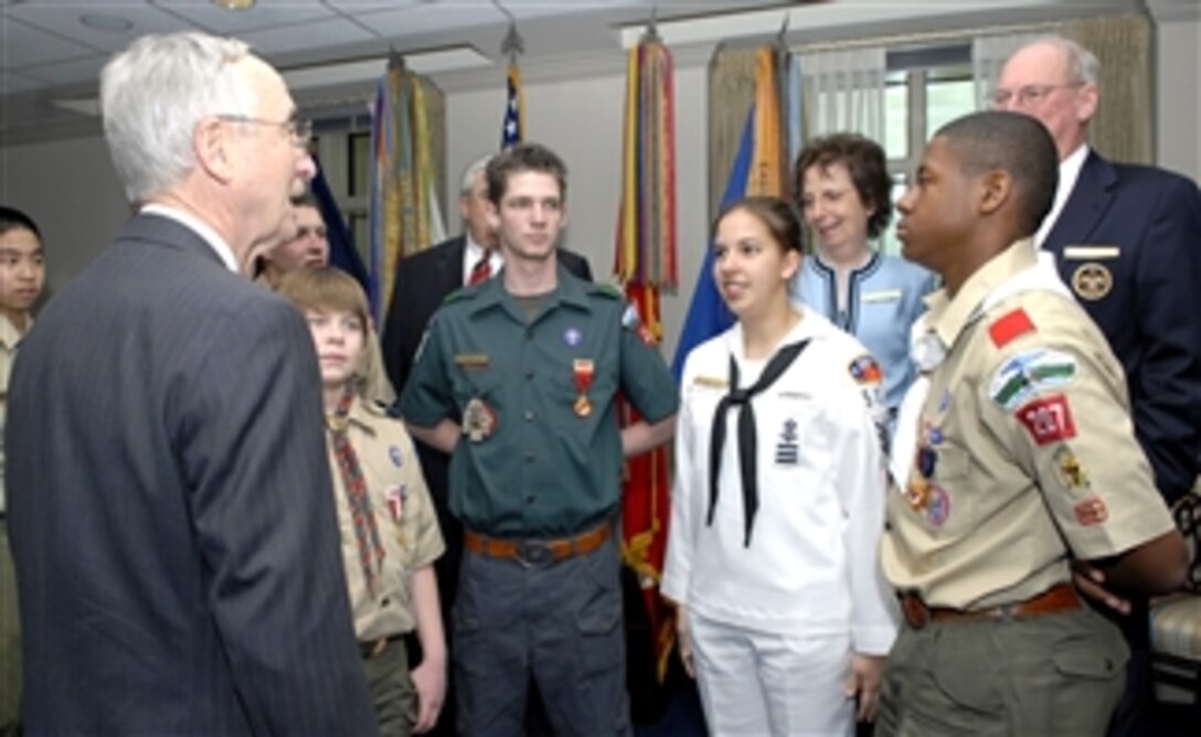 Deputy Defense Secretary Gordon England talks to the Boy Scouts of America during their visit to the Pentagon to show their appreciation of England and his work, March 4, 2008.  