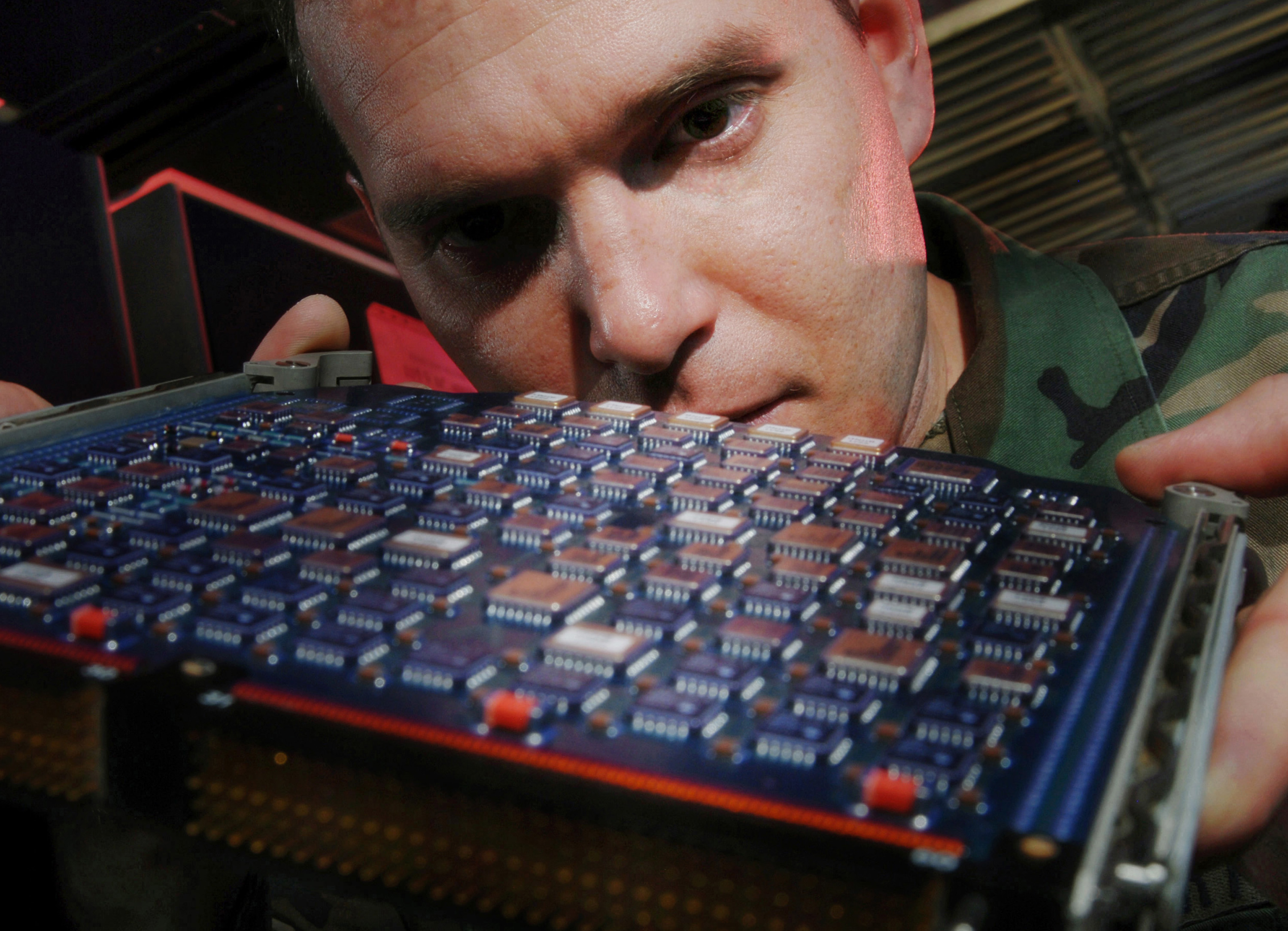 Avionics integrated technician inspects C17's headup display > March