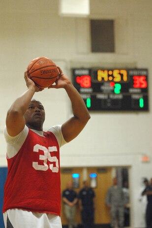 NELLIS AIR FORCE BASE, Nev.—Airman 1st Class Trenton Sellers, 99th Logistics Readiness Squadron, concentrates  for a free throw during the Nellis 2008 intramural basketball championship game, Feb. 27. The 57th Equipment Maintenance Squadron Munitions Flight took home this year’s championship trophy, defeating 99th LRS 73-63. (U.S. Air Force photo by Senior Airman Larry E. Reid Jr.)