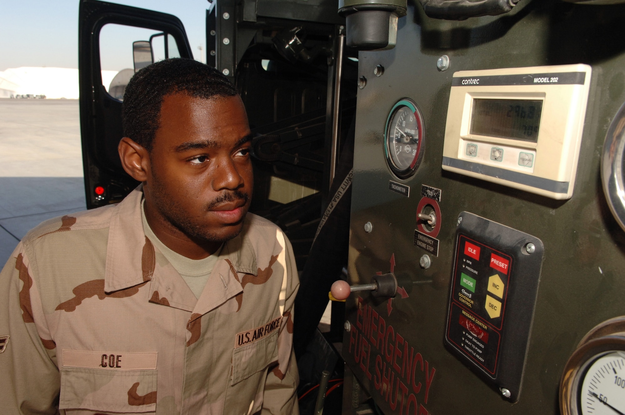 Airman 1st Class Zechariah Coe, fuels distribution operator, 380th Expeditionary Logistics Readiness Squadron watches the counter for JP-8 jet fuel being pumped into a KC-10 Extender as he breaks the Air Force record for the largest amount of fuel pumped in a month, Southwest Asia, Monday, February 25, 2008. Airman Coe took on every refueling opportunity he could to pump the more than 3,573,989 gallons of fuel that was required to break the previous record.
