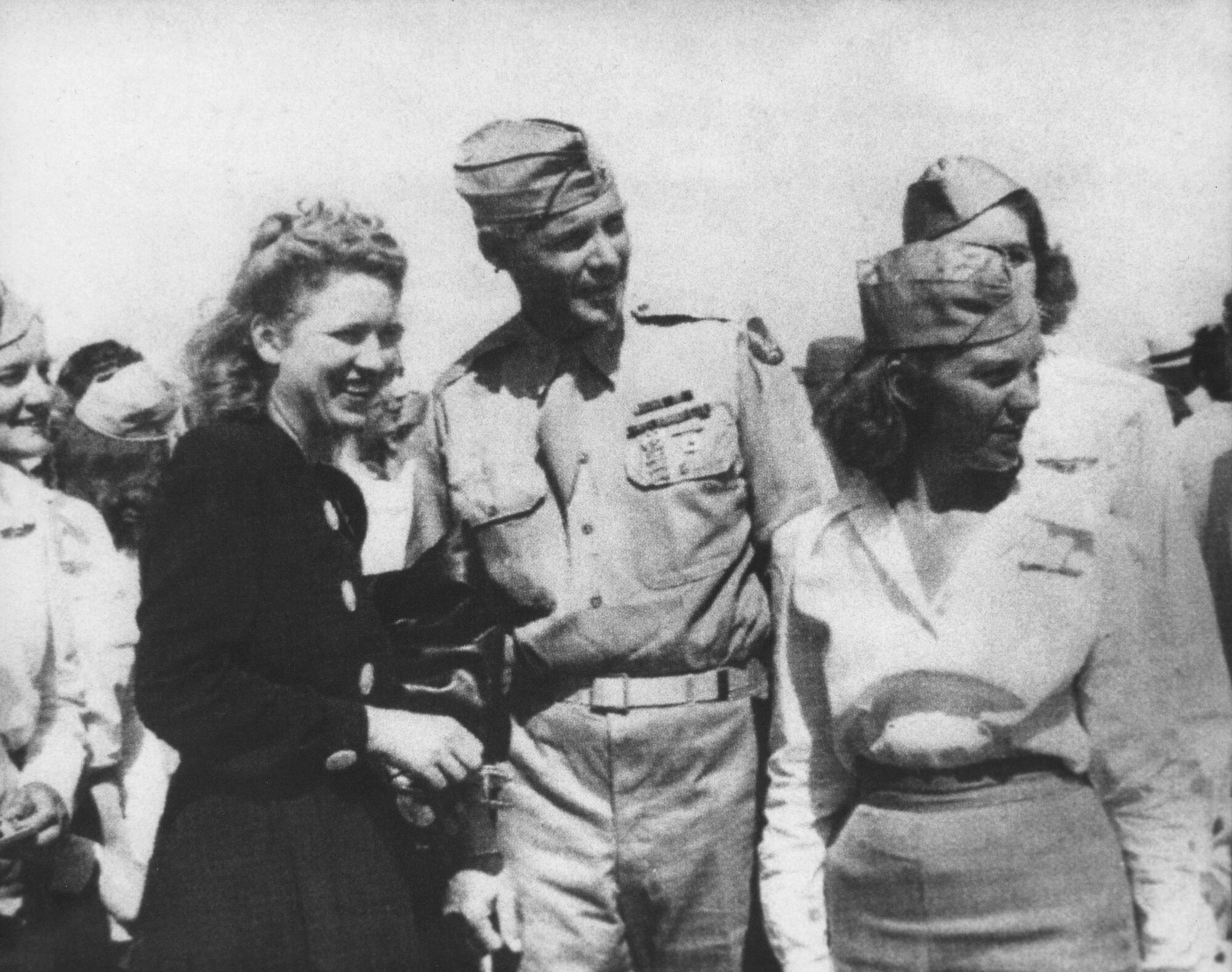 Jacqueline Cochran, one of the founders of the WASP, (left) with her Army Air Force adjutant and trainees at Avenger Field, Sweetwater, Kansas. (Photo courtesy Air Armament Center History Office)