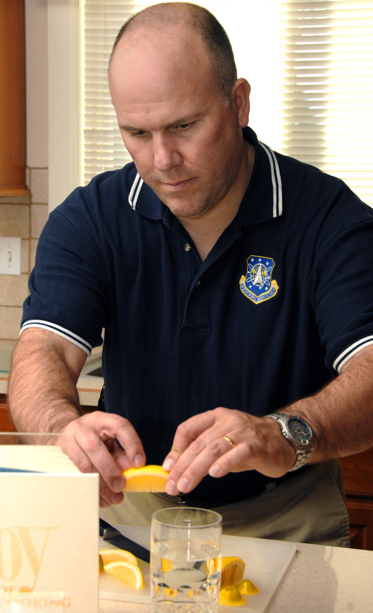 PETERSON AIR FORCE BASE, Colo. – Master Sgt. Patrick Lilly takes great pains with the day-to-day details in taking care of a four-star general.  The sergeant received his official recognition Feb. 28 as the 2007 Air Force Junior Enlisted Aide of the Year while he was the junior aide for the U.S. Air Forces in Europe commander at Ramstein Air Base, Germany. Sergeant Lilly was also awarded a check to cover the cost of tuition to the prestigious Culinary Institute of America in Hyde Park, N.Y. (U.S. Air Force Photo by Duncan Wood)