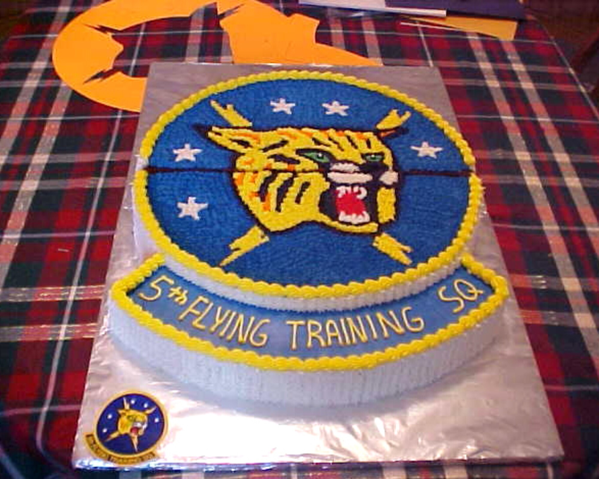 Retired Chief Master Sgt. Steven Long builds cakes of many shapes and sizes and constructs them in stages. This cake represents the 5th Flying Training Squadron at Vance Air Force Base, and was in the final stages of preparation before presentation. (Photo couresty of Steven Long) 