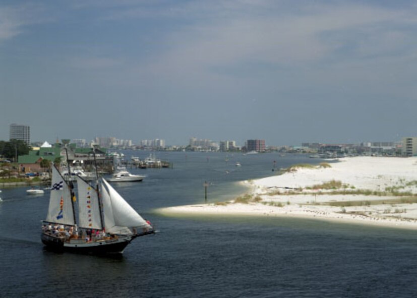 Landscape of a sailboat on Choctawhatchee Bay in the local area.  The beautiful climate and beaches make Eglin a unique location for vacationing and fun.