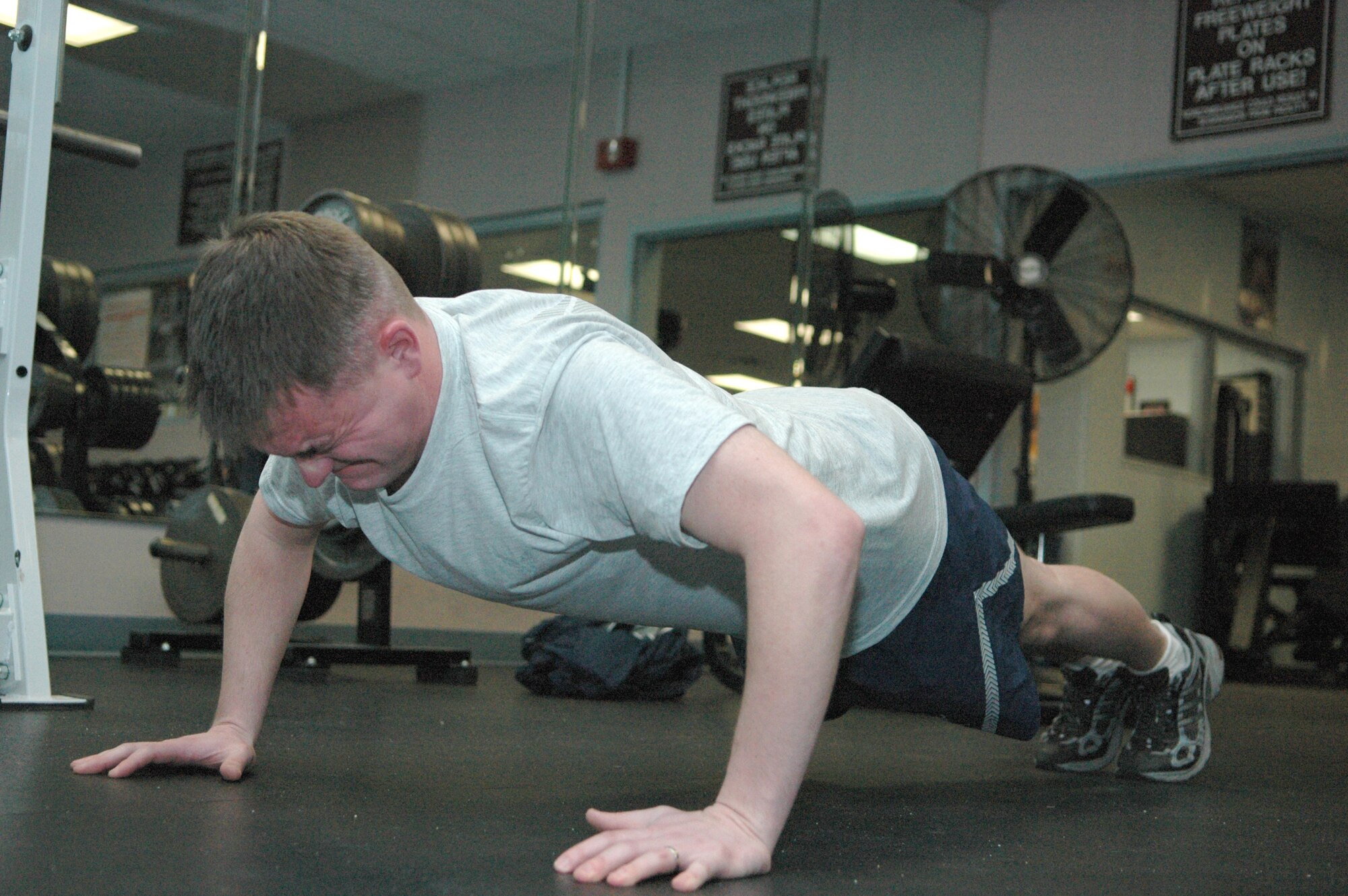 GRISSOM AIR RESERVE BASE, Ind., -- Staff Sgt. Daniel Hutchinson, a computer systems operator with the 434th Communications Squadron, pushes for the maximum amount of push-ups for his annual physical fitness exam. (U.S. Air Force photo/Senior Airman Ben Mota)