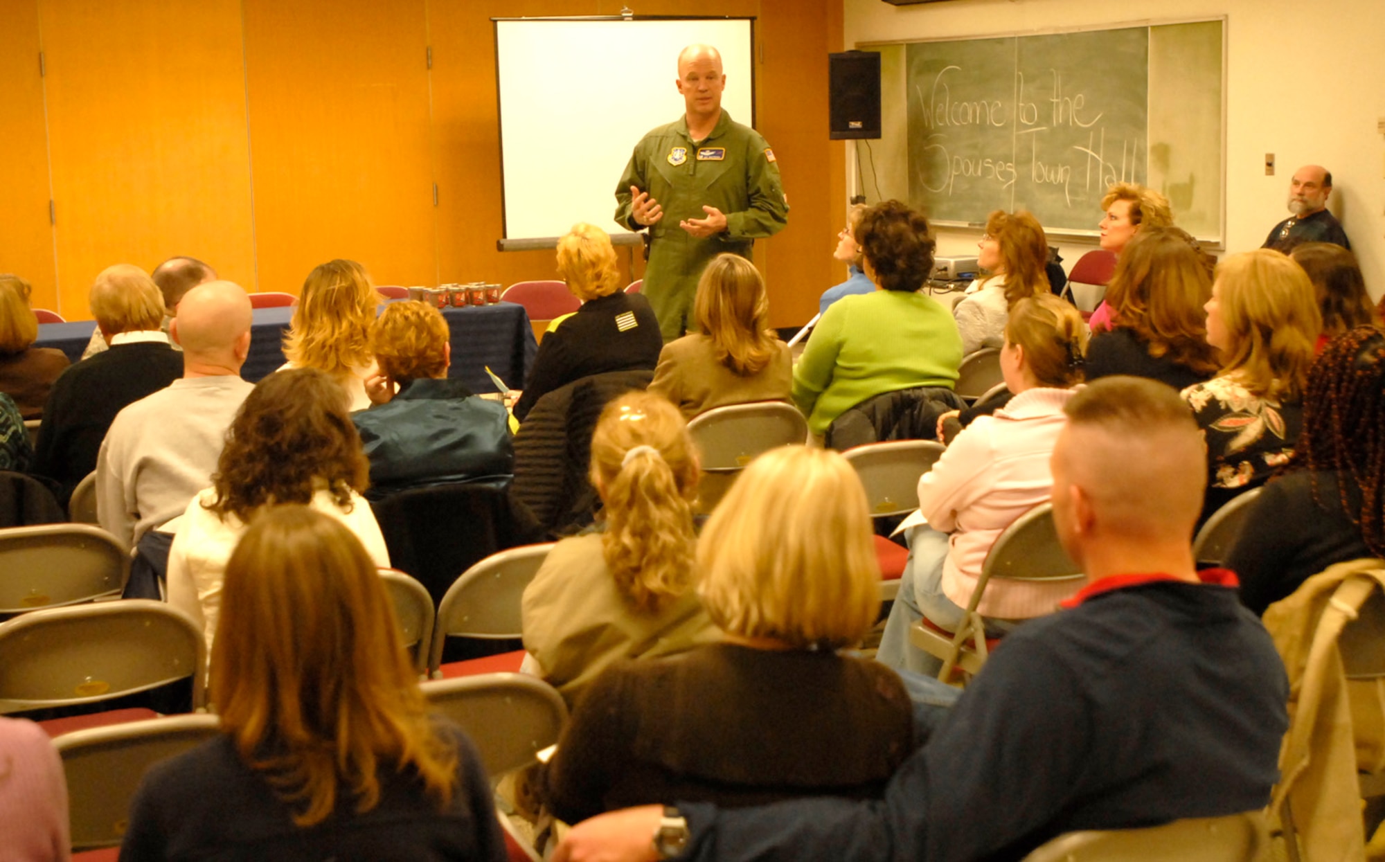 Col. Jay Raymond, commander of the 21st Space Wing, speaks to the
audience during Peterson's Spouses Town Hall Mar. 3. Dozens of spouses
attended the meeting, which highlighted events and services available here
to Airmen and their families. (U.S. Air Force photo/Corey Dahl)
