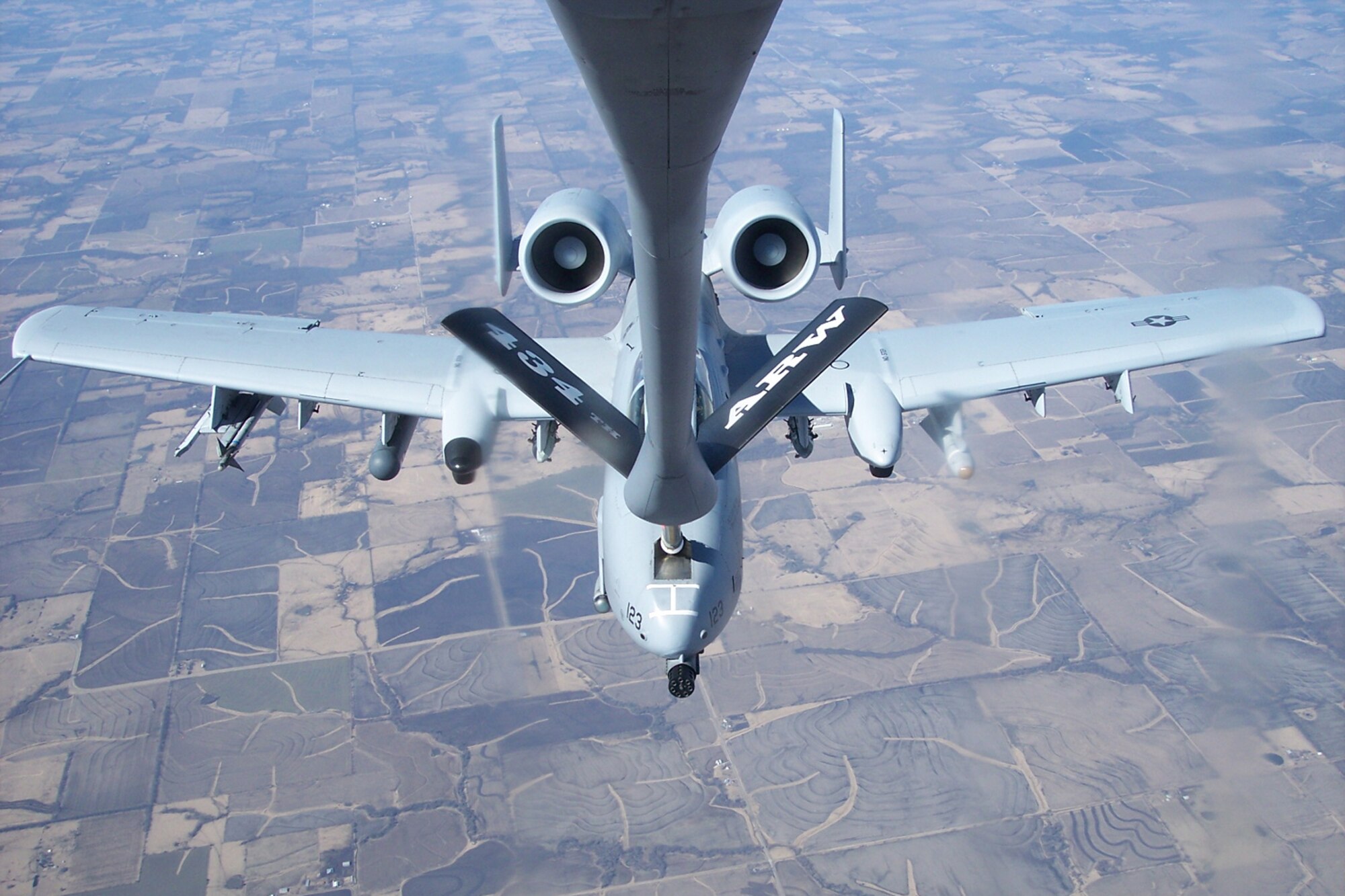 GRISSOM AIR RESERVE BASE, Ind., -- A Grissom KC-135R Stratotanker offloads fuel to an A-10 Thunderbolt from Whiteman AFB, Mo., during a refueling mission. . The refueling took place in the skies over Missouri. KC-135R Stratotankers are capable of refueling a variety of fighter, bomber and cargo aircraft. (U.S. Air Force photo/Tech. Sgt. Drennen Gaffney)