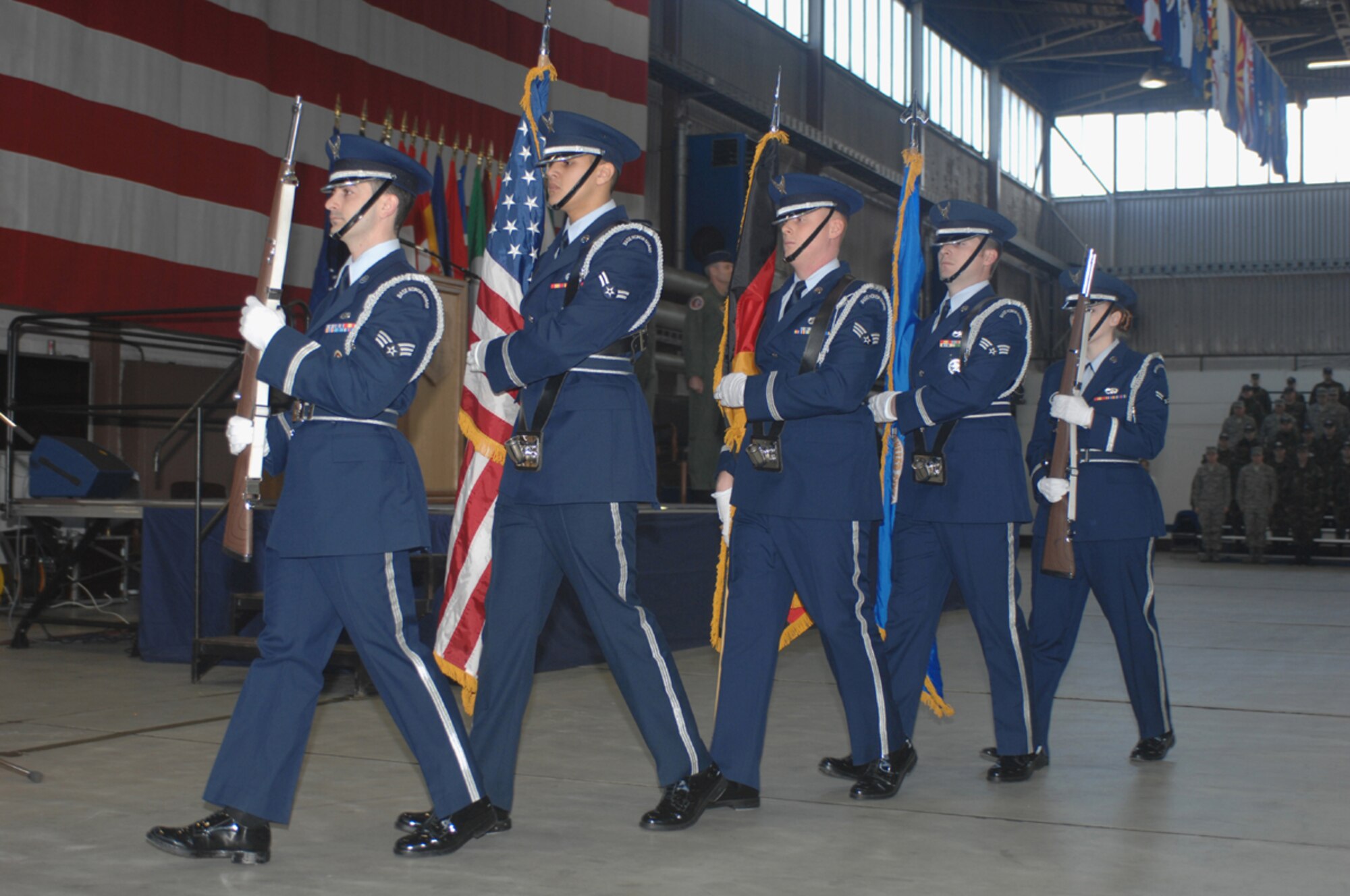 SPANGDAHLEM AIR BASE, Germany – Members of the 52nd Fighter Wing Honor Guard march to the stage to present the colors during the 52nd Fighter Wing Celebration of Command Ceremony March 5, 2008. During the ceremony Colonel Roberson turned command of the 52nd FW over to Colonel Feldhausen. (U.S. Air Force photo/Staff Sgt. Heather M. Norris)