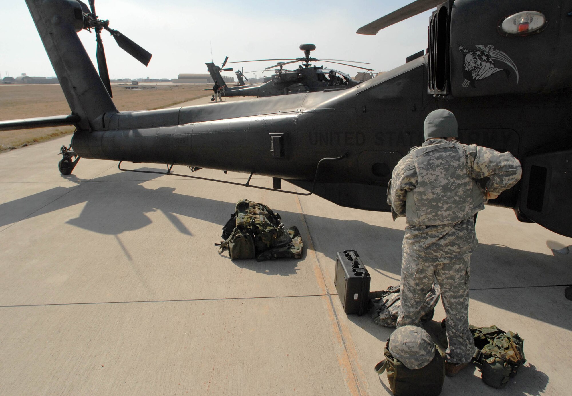 KUNSAN AIR BASE, South Korea -- Captain Ashley Lee, an AH-64 Apache helicopter pilot, touches down after arriving here Mar. 1.  The Apache's arrived from Camp Humphrey's, Bravo Company 4-2, as part of the Key Resolve/Foal Eagle exercise, enhancing combat readiness and joint interoperability.  (U.S. Air Force photo/Senior Airman Steven R. Doty) 