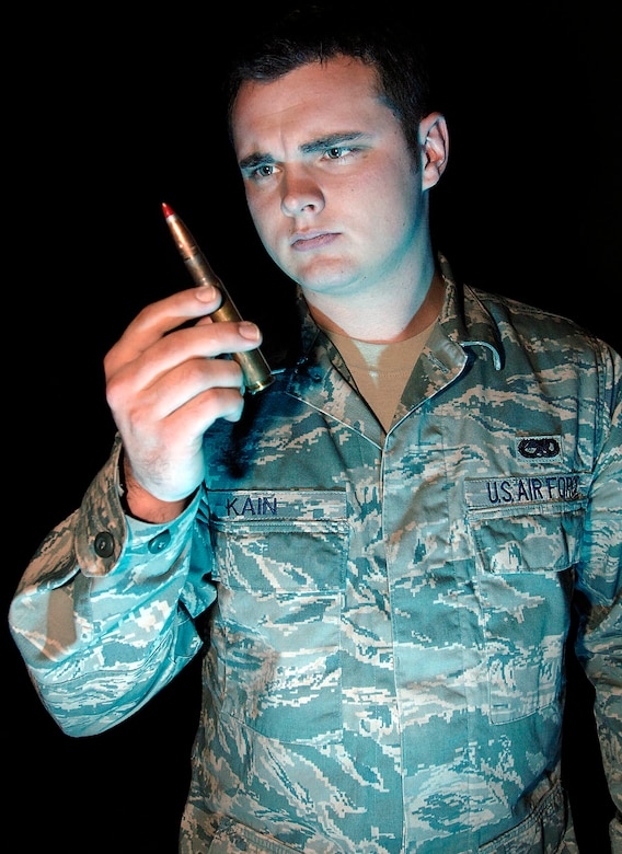 FAIRCHILD AIR FORCE BASE, Wash. – Senior Airman Darron Kain, 92nd Maintenance Squadron munitions inspector, performs visual inspection on fifty caliber munitions to check for cracks and deformities on the munitions ensuring they are safe for distribution to the war fighter. Airman Kain was chosen to be featured in an upcoming Air Force Technology Education Magazine highlighting various military jobs. The calendar will be distributed throughout high schools across the country and used for recruitment purposes.  (U.S. Air Force photo/Staff Sgt. JT May III)