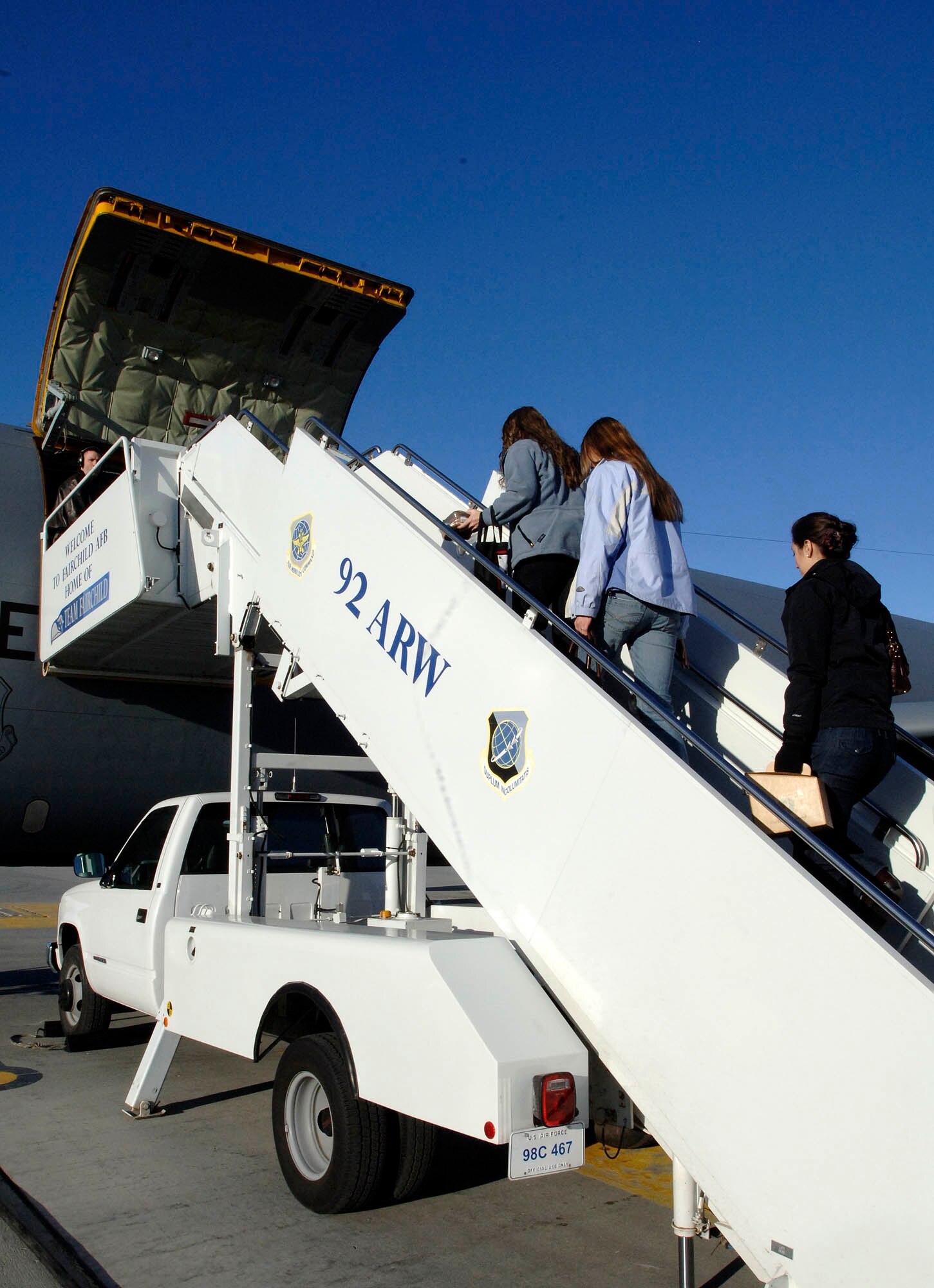 FAIRCHILD AIR FORCE BASE, Wash. – Spouses from the 93rd Air Refueling Squadron board a KC-135 Stratotanker on March 5. The spouses took part in an orientation flight as part of an ongoing program that familiarizes spouses with a routine day at the 93rd ARS. The day started with a preflight brief, followed by a four- hour flight and concluded with a post brief. (U.S. Air Force photo/Staff Sgt. JT May III)