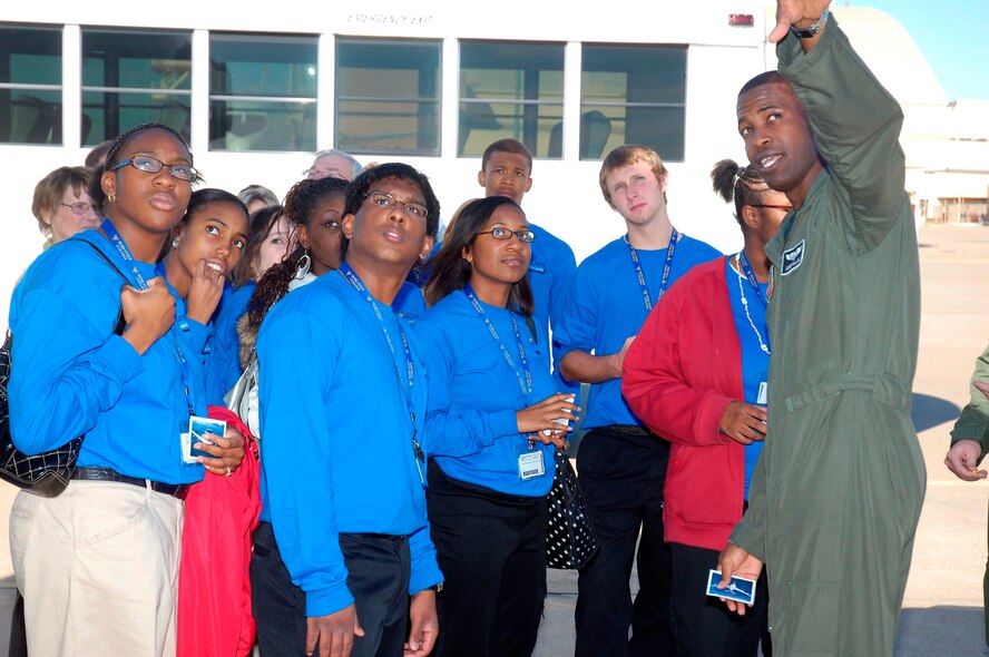Captain Lonzo E. Wallace, 960th Airborne Air Control Squadron, points out aspects of the E-3 Sentry to several outstanding DelQuest students. Photo compliments of Visual Information.