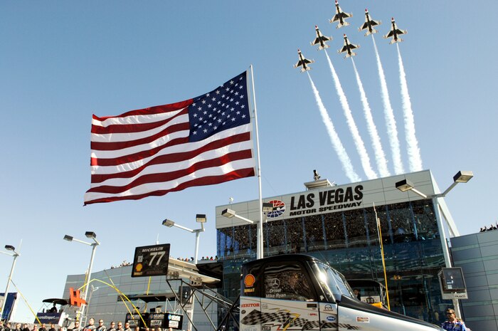 LAS VEGAS--The U.S. Air Force Aerial Demonstration Team, the Thunderbirds, fly over the Las Vegas Motor Speedway during opening ceremonies of the UAW Dodge 400 NASCAR event here March 2. For more than a decade, the Nellis AFB community and Las Vegas Motor Speedway family have enjoyed a cooperative relationship that both thrills race fans and emblazons the patriotic spirit of America. (U.S. Air Force photo/Master Sgt Robert W. Valenca)