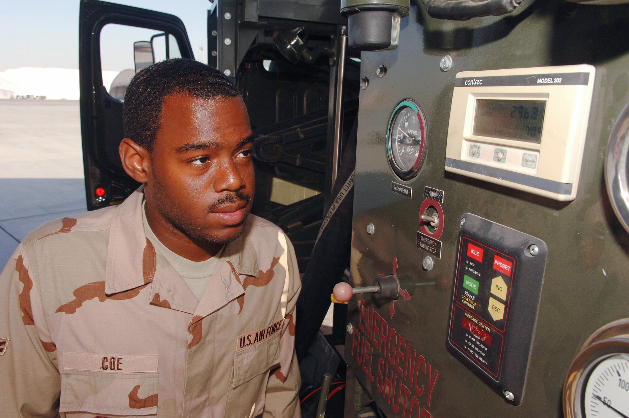 Airman 1st Class Zechariah Coe, fuels distribution operator, 380th Expeditionary Logistics Readiness Airman 1st Class Zechariah Coe watches the counter for JP-8 jet fuel being pumped into a KC-10 Extender as he breaks the Air Force record for the largest amount of fuel pumped in a month Feb. 25 in Southwest Asia. Airman Coe took on every refueling opportunity he could to pump the more than 3,573,989 gallons of fuel that was required to break the previous record. Airman Coe is a fuels distribution operator with the 380th Expeditionary Logistics Readiness Squadron. (U.S. Air Force photo)