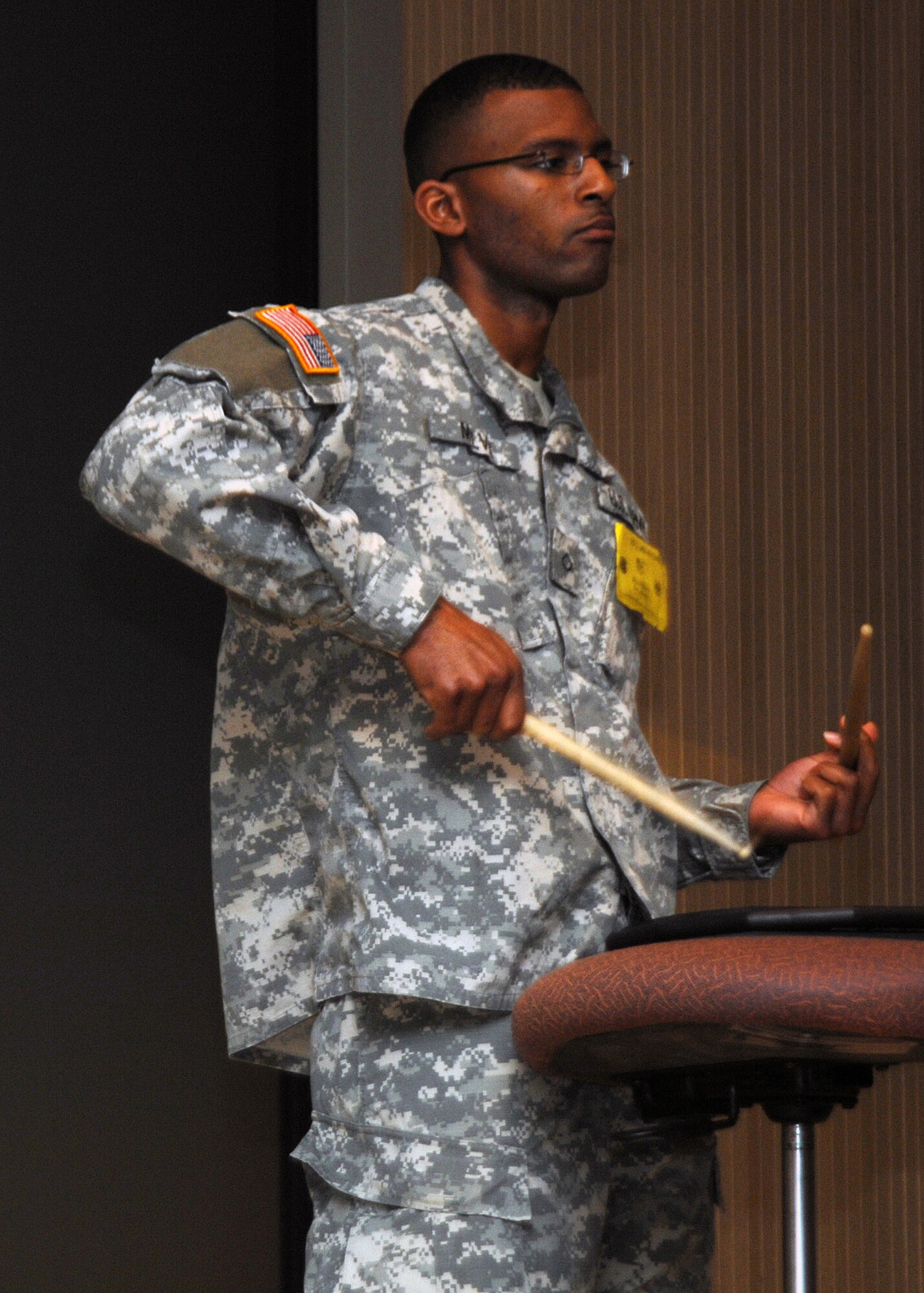 Pvt. Bobby Melvin hammers out a rhythm March 3 during an All-Army Talent Show in Bldg. 1900. Private Melvin and other Soldiers from D Company, 264th Medical Battalion at Sheppard Air Force Base competed in the show. Here are the results of the show: 1st Place - Pvt. Christopher McLaughlin; 2nd Place - Pvt. Samantha Hinkley; and 3rd Place - Spc. Willard Wilson. (U.S. Air Force photo/Lou Anne Sledge)