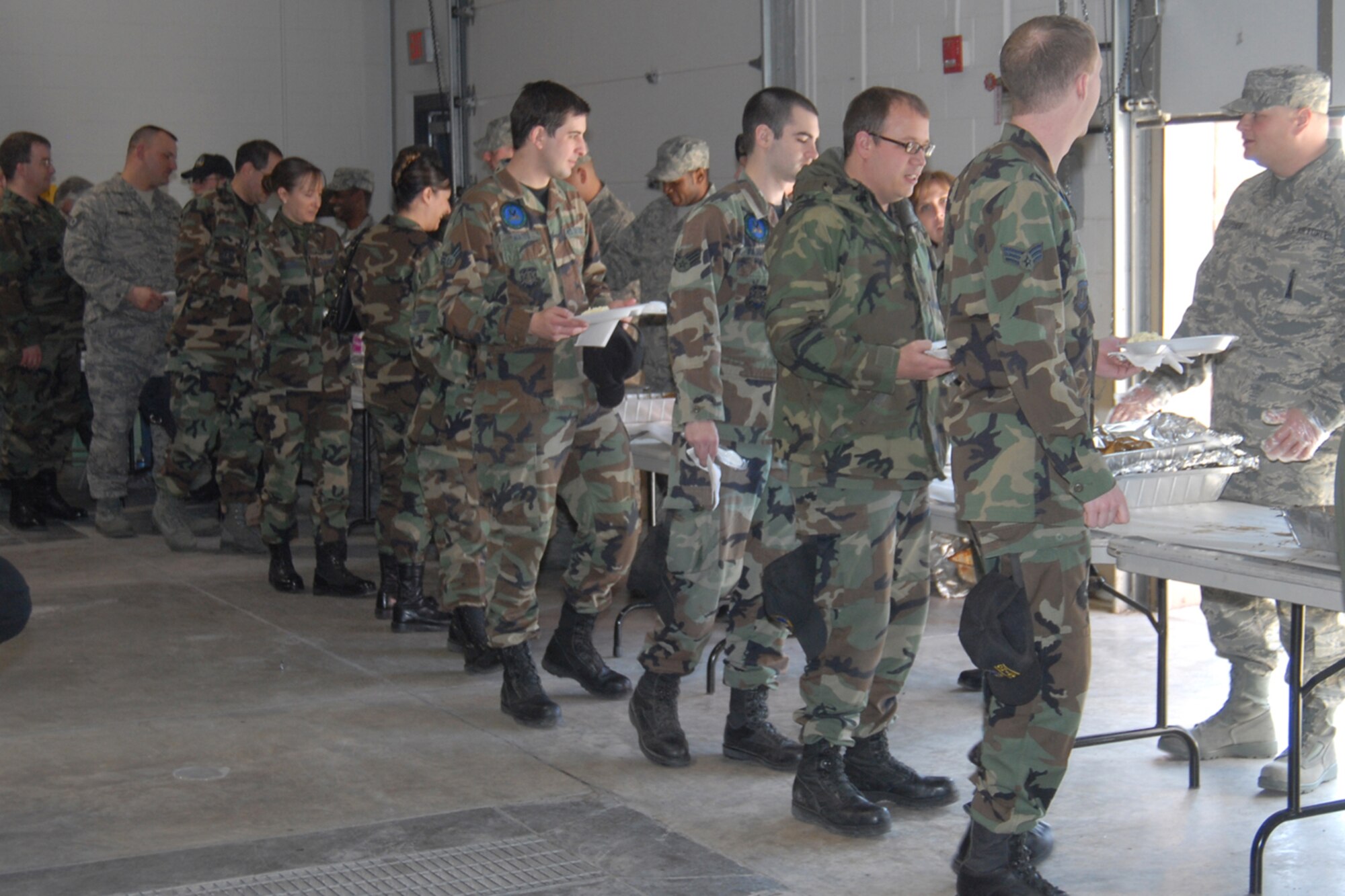 Warren members participate in a barbecue fund-raising event Feb. 29 for the Guardian Challenge. The competition begins April 28 and lasts until May 3. More than 200 people attended U.S. Air Force photo/Shelley Raffl).