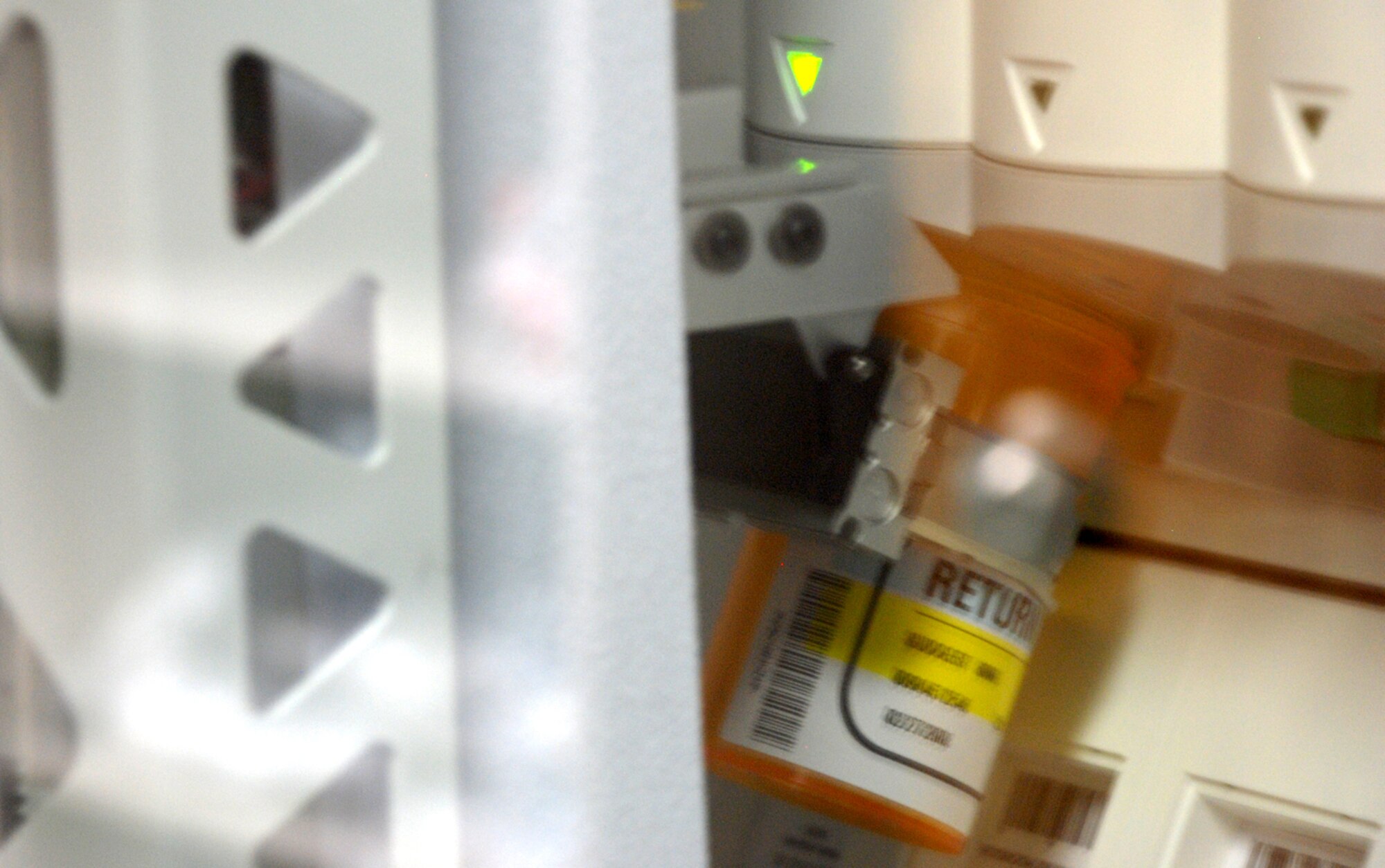 The base pharmacy’s newest system sends a robotic arm to collect the prescription medicine as it is released. The fully automatic machine counts the medicine and labels the bottle upon completion.