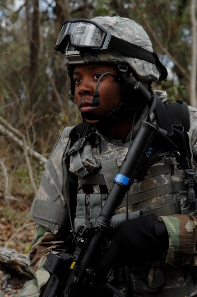 MOODY AIR FORCE BASE, Ga. – Airman 1st Class Mardriquez Dennis, 822nd Security Forces Squadron fire team member, protects his sector during a field training exercise here March 3. The exercise prepared new Airmen for combat scenarios they may encounter during an upcoming deployment. (U.S. Air Force photo by Senior Airman Angelita Lawrence) 
