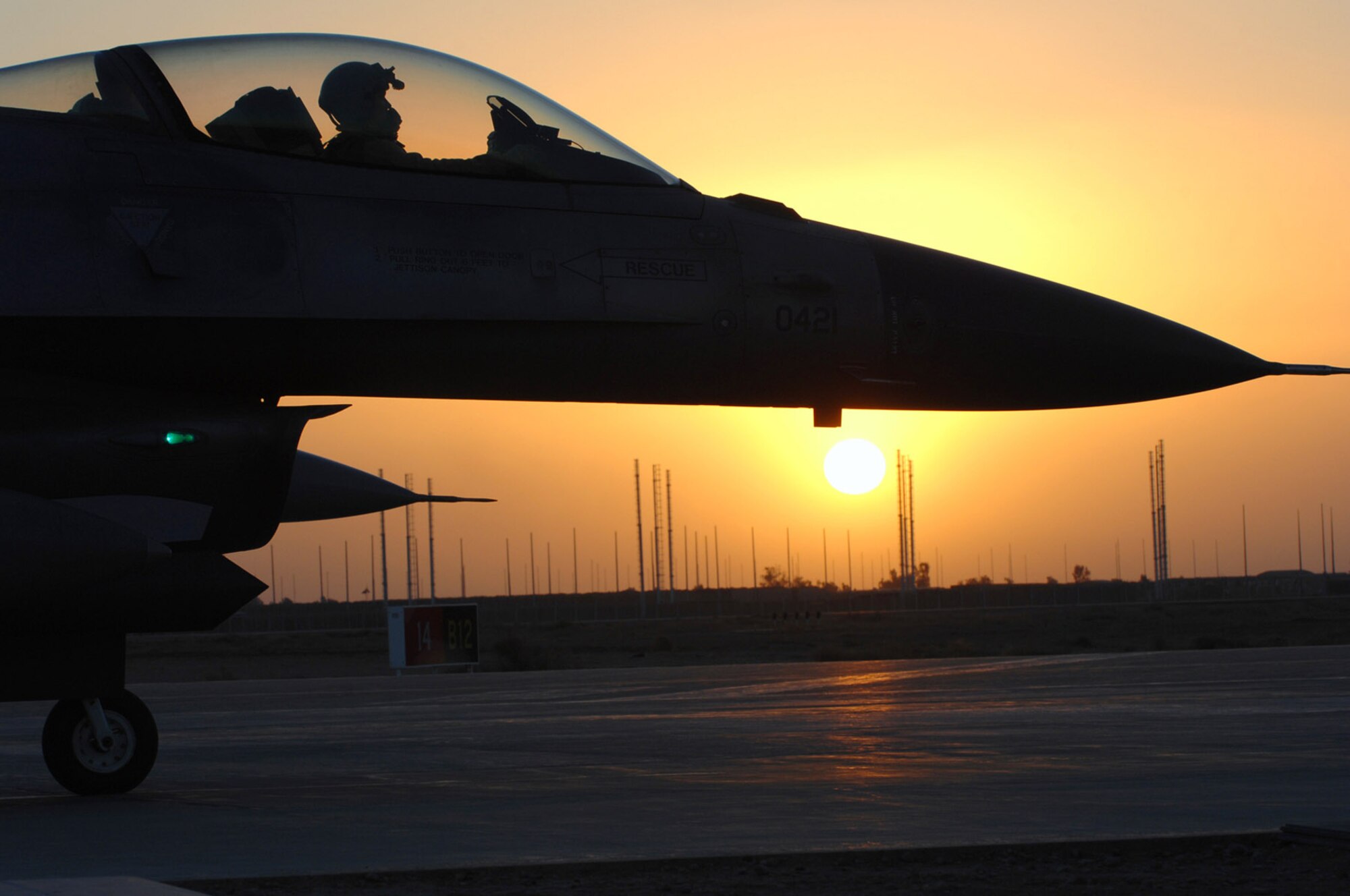 Lt. Col Geoffrey Maki waits to depart Balad Air Base, Iraq, on a mission supporting Operation Iraqi Freedom.  He is a pilot with the 23rd Expeditionary Fighter Squadron, and deployed from Spangdahlem Air Base, Germany. (U.S. Air Force photo/Senior Airman Julianne Showalter)