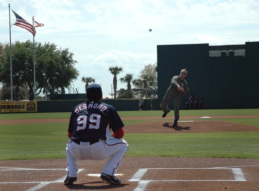 VIERA, Fla. -- The 920th Rescue Wing was honored by the Washington Nationals baseball team as part of military appreciation day, held here today at the team's spring-training home, Space Coast Stadium. Rescue Wing commander Col. Steven Kirkpatrick opened the game by tossing one of several ceremonial first pitches. Pararescueman Master Sgt. Michael Gorsline also took part in the pre-game ceremony. (U.S. Air Force photo/Staff Sgt. Paul Flipse)