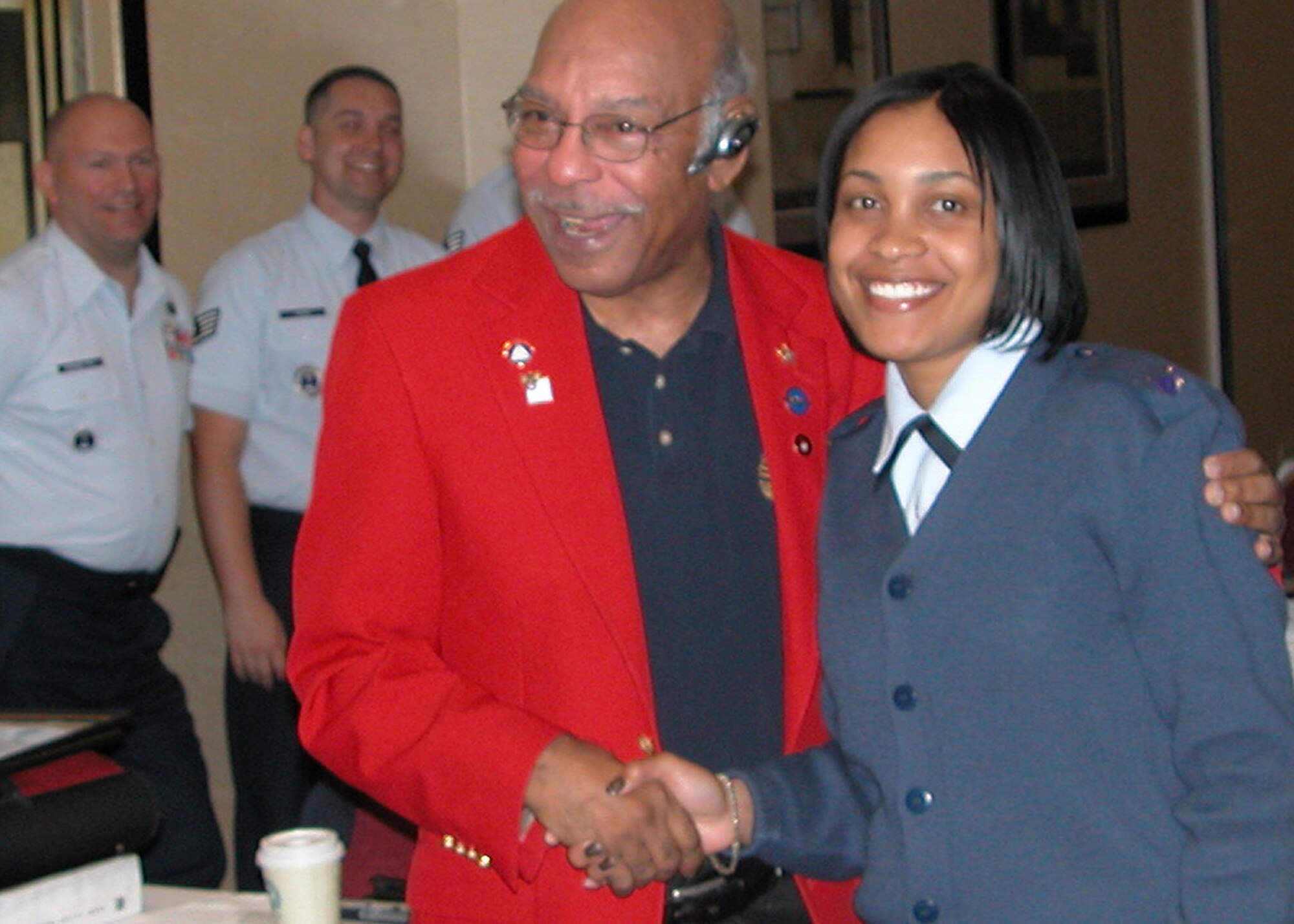 Retired Lt. Col. Alfonzo Jackson poses for a photo with Staff Sgt. Katrina Medley, 336th Recruiting Squadron enlisted accessions recruiter assigned to the Columbus, Ga., office on March 7. The 336th RCS commander presented Colonel Jackson the Air Force Recruiting Salutes Award in recognition of the Tuskegee Airman’s outstanding support to Air Force recruiting. (U.S. Air Force photo/Staff Sgt. Joshua Martin)