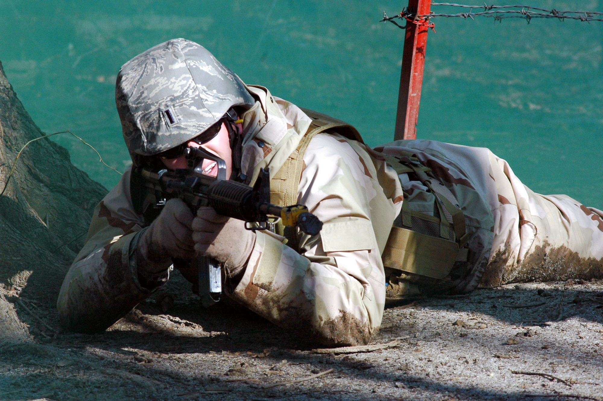 1st Lt. Jared Casebolt provides "suppressing fire" as one of the lead security elements going through the combat first aid obstacle course Feb. 29 on a range on Fort Dix, N.J. Taught by Expeditionary Operations School officials, Air Force Expeditionary Center's Air Advisor Course 08-1 prepares Airmen deploying to Afghanistan and Iraq who will in turn be training military forces in those countries. Lieutenant Casebolt is from the 366th Civil Engineer Squadron at Mountain Home Air Force Base, Idaho. (U.S. Air Force photo/Tech. Sgt. Scott T. Sturkol) 
