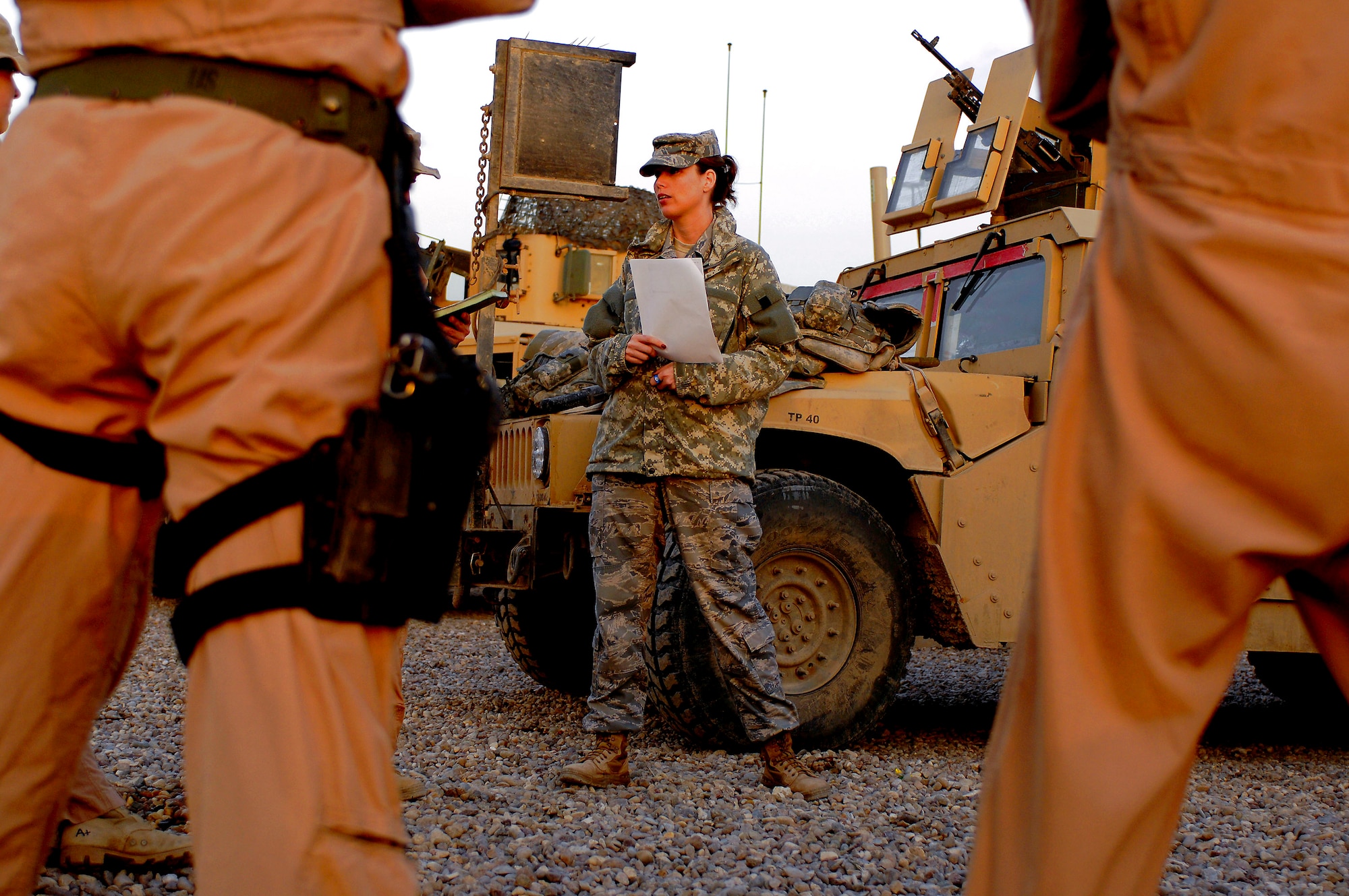 Tech. Sgt. Traci Bauder gives the morning intelligence brief Mar. 3 prior to a patrol of the southwest area of Baghdad, Iraq.  Sergeant Bauder is assigned to Detachment 3 of the 732nd Security Forces Squadron at Sather Air Base, Iraq and is deployed from the 377th Security Forces Squadron, Kirtland Air Force Base, N.M. (U.S. Air Force photo/Master Sgt. Andy Dunaway)