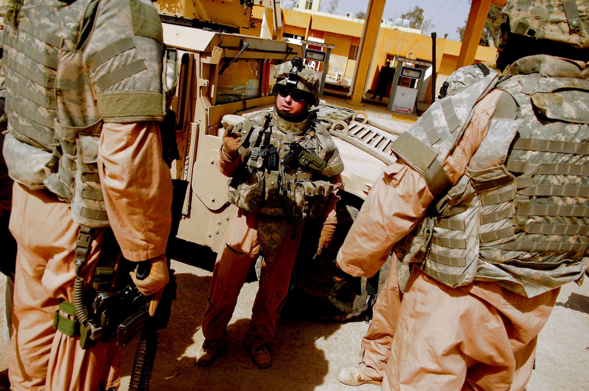Tech Sgt. Terry Miller briefs his squad after arriving at the national police joint security station Mar. 3 in Sayday, Iraq. Sergeant Miller is assigned to Detachment 3 of the 732nd Security Forces Squadron at Sather Air Base, Iraq, and is deployed from the 90th Security Forces Squadron, F.E. Warren Air Force Base, Wyo. (U.S. Air Force photo/Master Sgt. Andy Dunaway)
