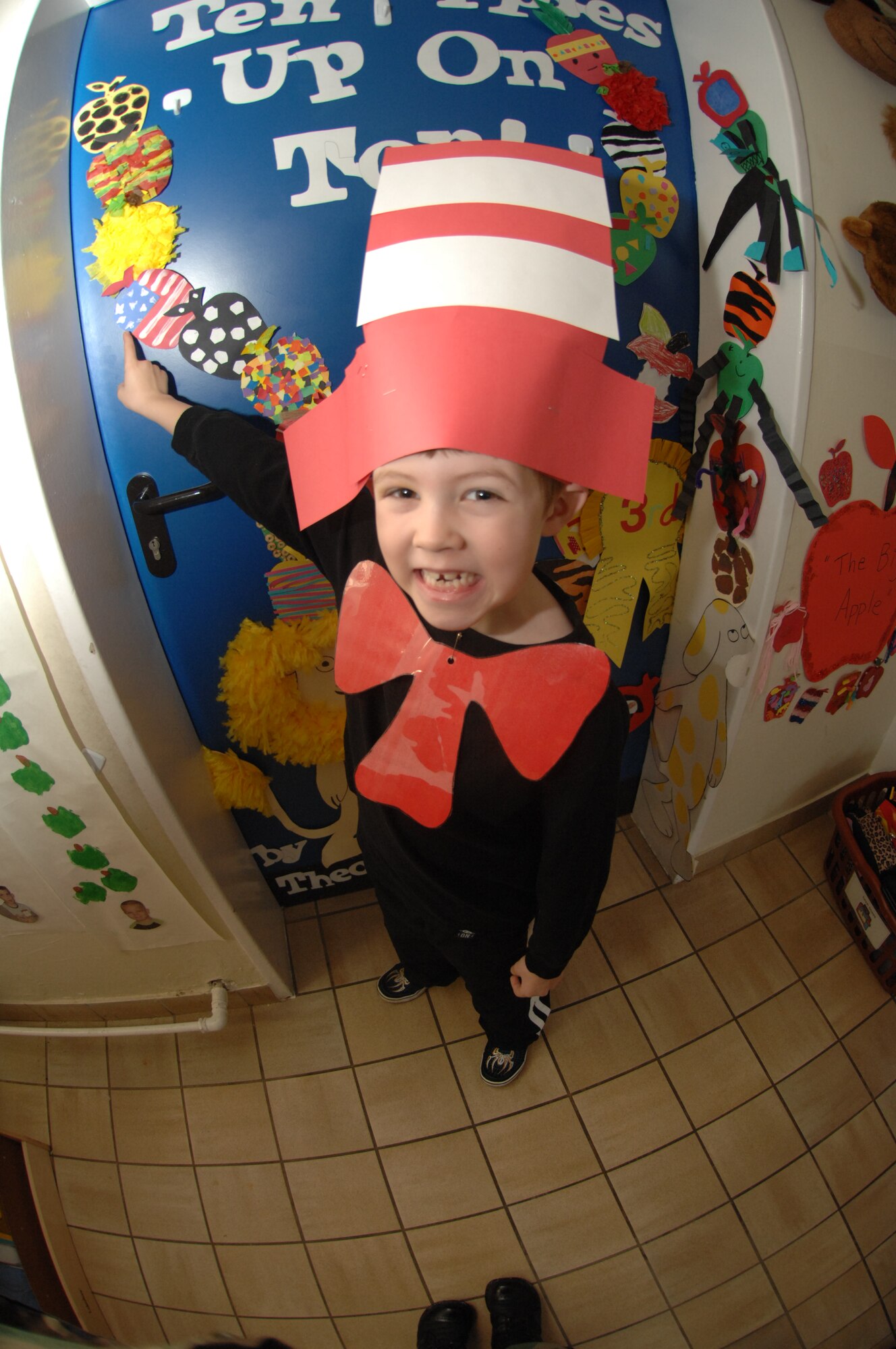 Spangdahlem AB, Germany- Owen Wilson, son of Senior Master Sergeant Patrick Wilson 606th Air Control Squadron, displays the apple he created March 7, 2008 at Spangdahlem Elementary School Door Decorating Contest as part of Read Across America week. (U.S. Air Force photo by Airman 1st Class Jenifer Calhoun)