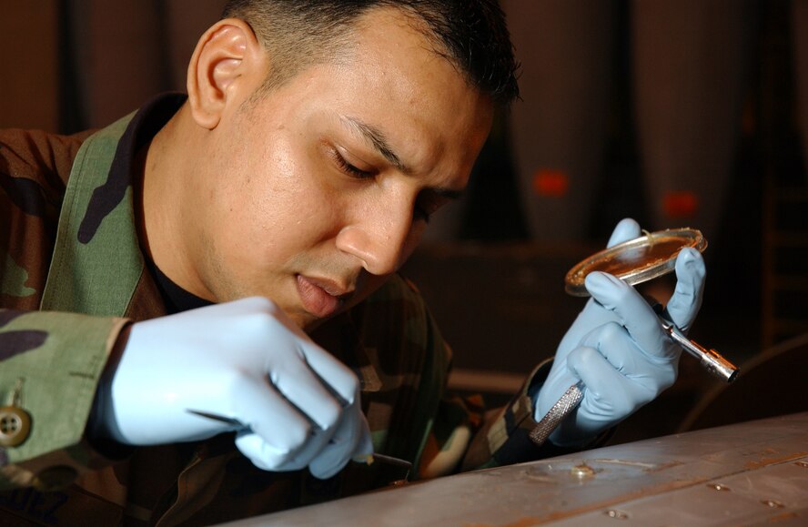 Staff Sgt. Gerardo Valdez, 18th Component Maintenance Squadron Fuels Flight, seals all the bolts and rivets for an F-15 external fuel tank, before running pressurized checks for leaks during the 2008 Pacific Air Forces Operational Readiness Inspection at Kadena Air Base, Japan, March 10, 2008. PACAF is conducting the inspection from March 9 to 15 to validate the mission readiness of the 18th Wing.
(U.S. Air Force photo/Senior Airman Jeremy McGuffin)