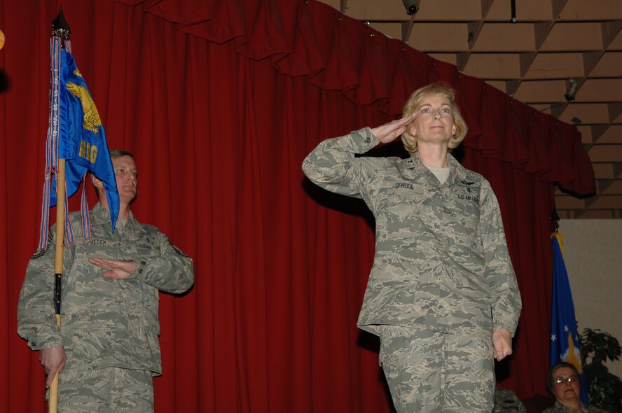 FAIRCHILD AIR FORCE BASE, Wash. – Col. Anne Sproul gives her first salute to the 92nd Medical Group as MDG commander during a change of command ceremony here March 6. Colonel Sproul comes to Fairchild from Lackland Air Force Base, Texas. (U.S. Air Force photo/Senior Airman Jocelyn Ford)