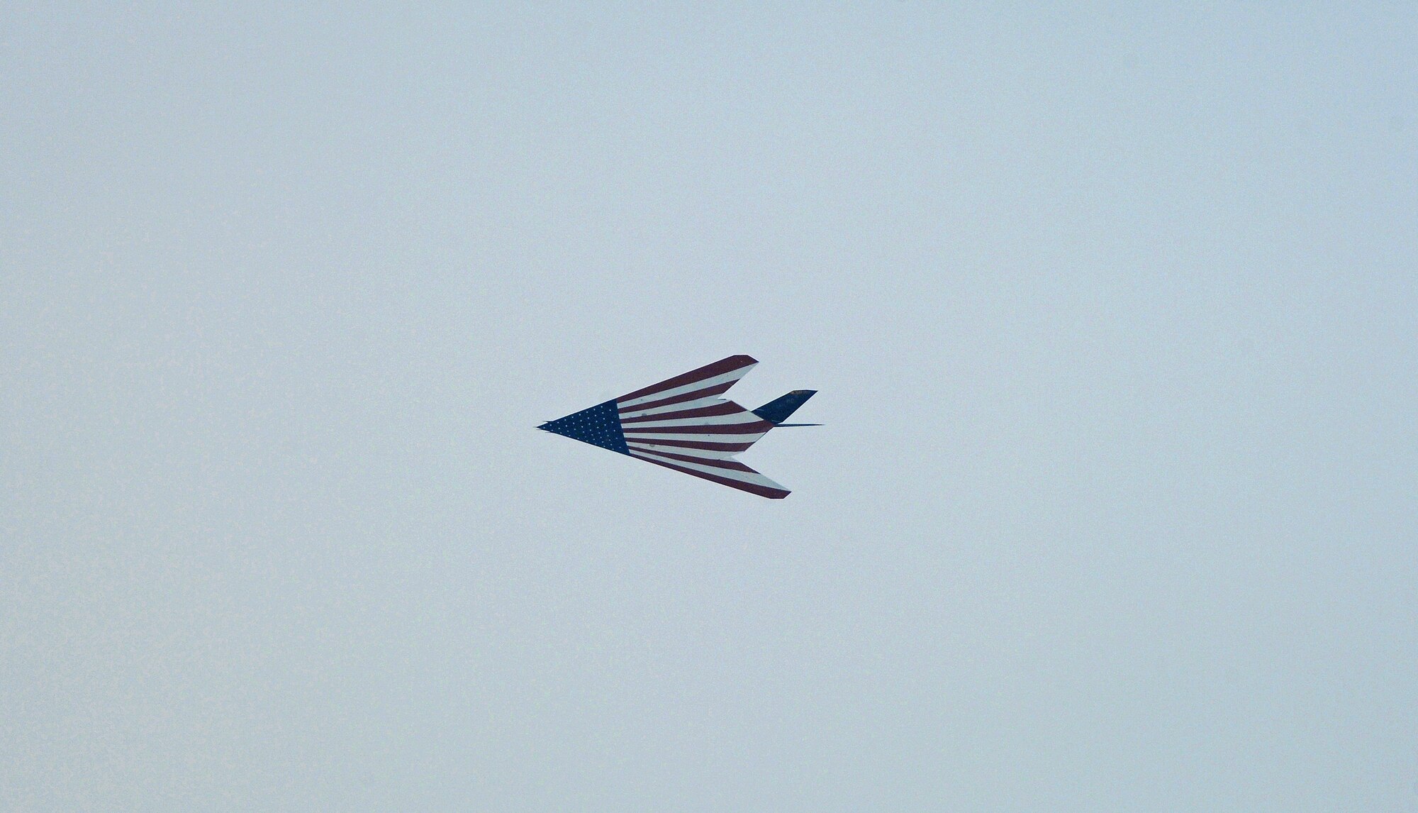 An F-117A piloted by Capt. Michael Driscoll of the 9th Fighter Squadron at Holloman Air Force Base, N.M. makes a fly-by during a retirement ceremony for the stealth fighter fleet held Mar. 11 at Wright-Patterson AFB, Ohio.  After 27 years of service, F-117As will be placed in storage at their original home in Tonopah, Nev. (U.S. Air Force photo by Ben Strasser)