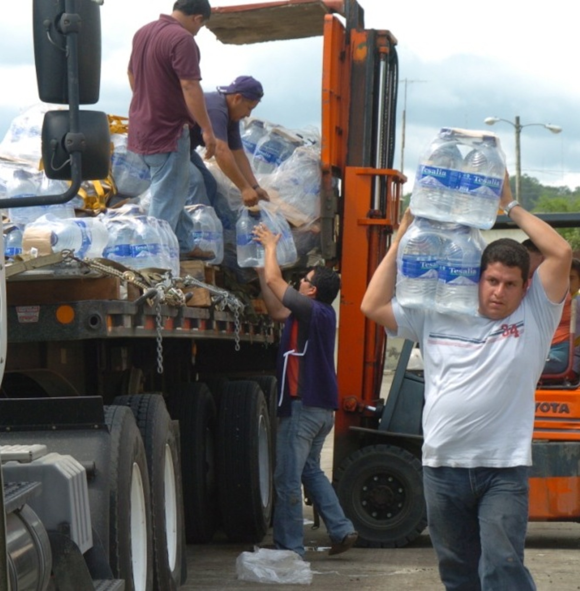 It took a group of roughly 25 volunteers over two hours to unload the IV bags, toilet paper and 2,571 one-gallon bottles of water into a storage room at the Napoleon Billa hospital in Chone, Ecuador.  They received $4,000 worth of flood relief supplies to help them recover and resupply from flood waters that had risen up to four feet high.  This is the worst flooding in two decades in Ecuador with 14 of the 23 provinces being negatively impacted by flood waters.  