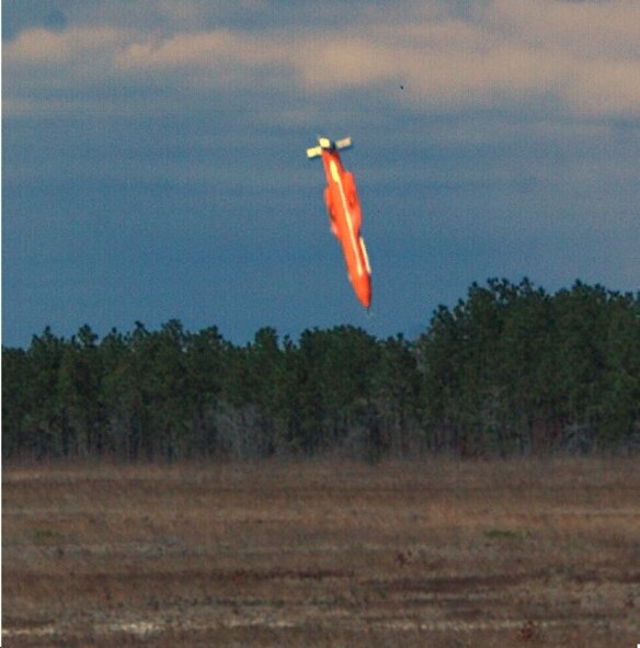 EGLIN AIR FORCE BASE, Fla. -- The GBU-43/B Massive Ordnance Air Blast bomb prototype moments before it makes contact March 11, 2003. The detonation created a mushroom cloud that could be seen from up to 20 miles away. (Courtesy photo)