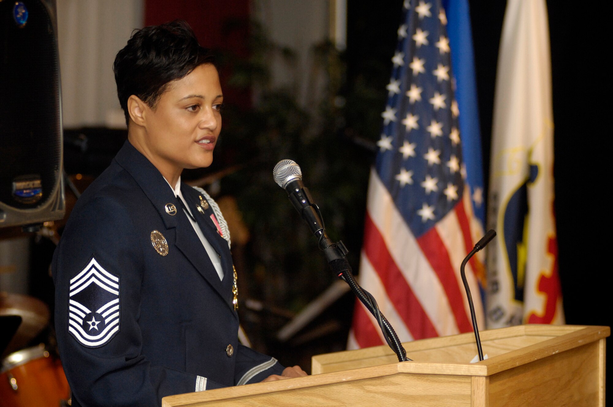 HANSCOM AFB, Mass. – Guest speaker Chief Master Sgt. Robin Johnson, the chief enlisted manager, United States Air Force Honor Guard, addresses the crowd during the Honor Guard Awards Banquet March 7. During her speech, Chief Johnson noted the accomplishments of the “total force” membership and praised the honor guard for their selfless dedication to rendering honors for deceased Air Force veterans. (U.S. Air Force photo by Mark Wyatt.)