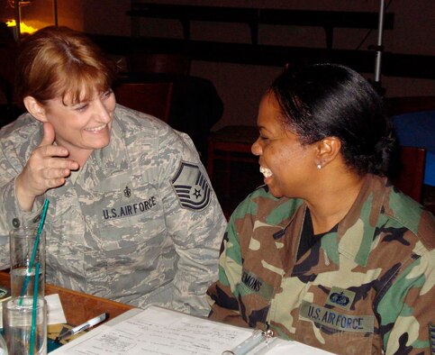 TRAVIS AIR FORCE BASE, Calif. -- Brainstorming: Master Sgt. Kathleen Covert, 349th Top Three, discusses Wing opportunities with Tech. Sgt. Gaylen Clemons, president, 349th Rising Six, during a Rising Six meeting at the Delta Breeze Club March 6. Rising Six meetings are held on the Saturday of each UTA at 4:45 p.m. in the Delta Breeze Club. Interested persons can get more information by contacting Sgt. Clemons at Gaylen.Clemons@travis.af.mil.  (U.S. Air Force photo/Staff Sgt. Meredith Mingledorff)