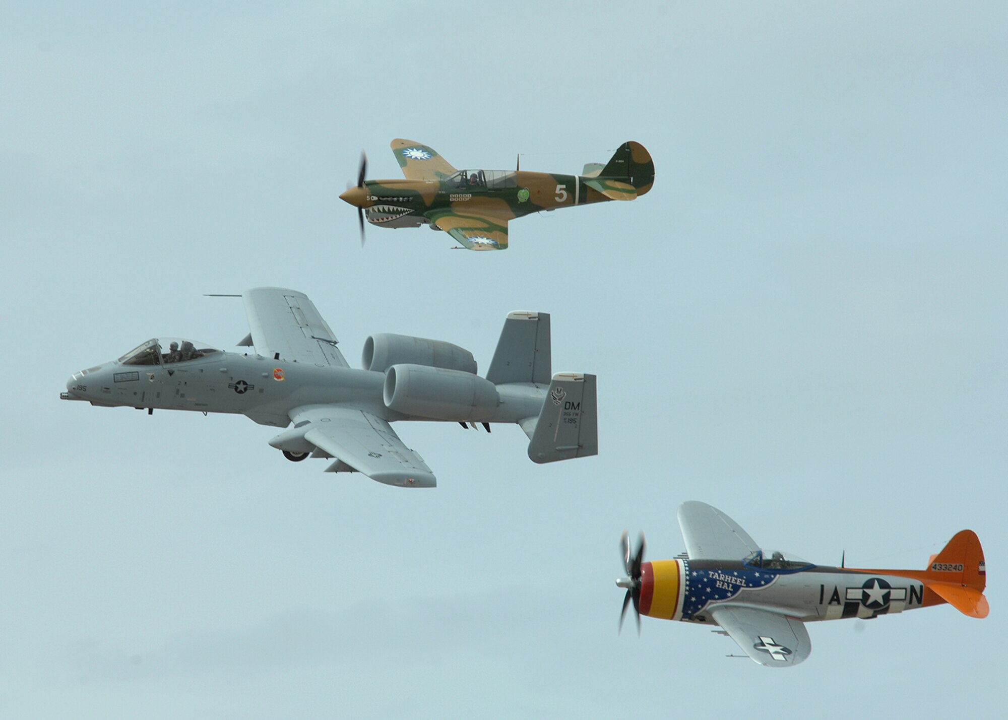 An A-10 Thunderbolt II from the A-10 West Coast Demonstration Team, a P-47, and a P-40 fly in formation during the 2008 Air Combat Command Heritage Flight Conference at Davis-Monthan AFB, Ariz, March 8. A P-51 Mustang, F-86 Sabre, and a F-15 from the West Coast demonstration team fly in formation during the 2008 Air Combat Command heritage Flight Conference, March 8 at Davis-Monthan AFB, Ariz. The Heritage Conference provides an opportunity for Air Combat Command demonstration pilots to train together with modern and historic military aircraft in preparation for the upcoming air show seasons. (U.S. Air Force photo by Senior Airman Christina D. Kinsey)