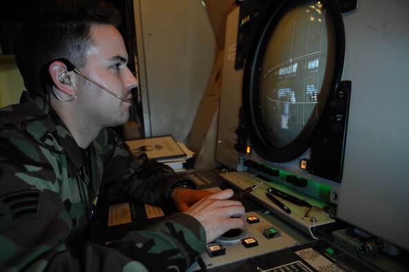 Senior Airman Nick Hartsock, an air traffic controller assigned to the 355th Operations Support Squadron, performs precision final approach procedures March 5 here. (U.S. Air Force photo/Senior Airman Christina D. Kinsey)