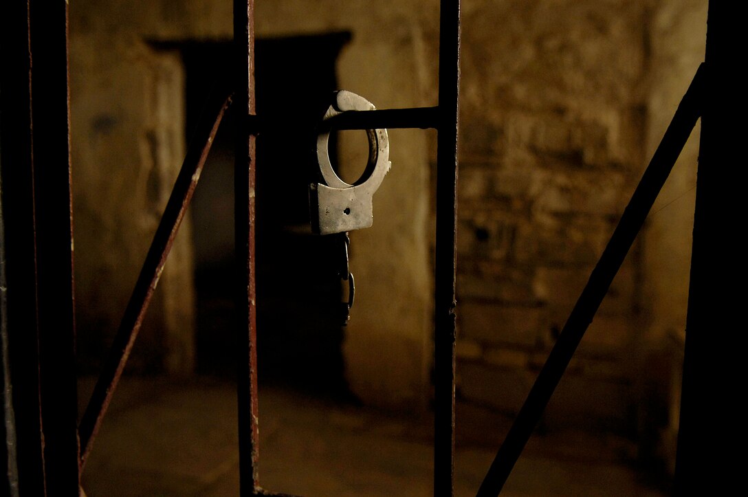 A handcuff is left behind in an al-Qaida torture house and prison March 10 in northern Zambraniyah, Iraq. A B-1B Lancer destroyed the house and prison with six guided bomb unit-38 Joint Direct Attack Munitions. (U.S. Air Force photo/Master Sgt. Andy Dunaway)