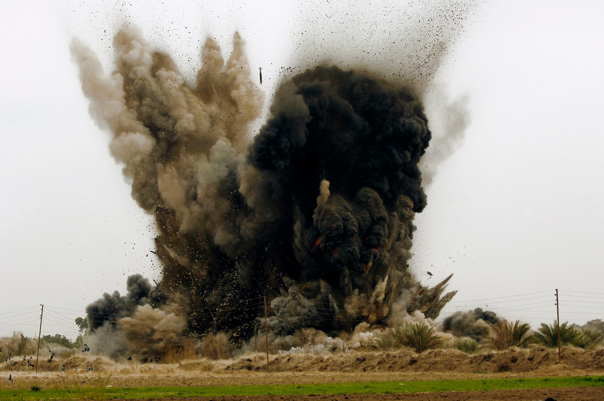 An al-Qaida torture compound and prison is destroyed after being hit with six guided bomb unit-38 Joint Direct Attack Munitions from a B-1B Lancer at 2:07 p.m. March 10 in Zenbaraniyah, Iraq. (U.S. Air Force photo/Master Sgt. Andy Dunaway)