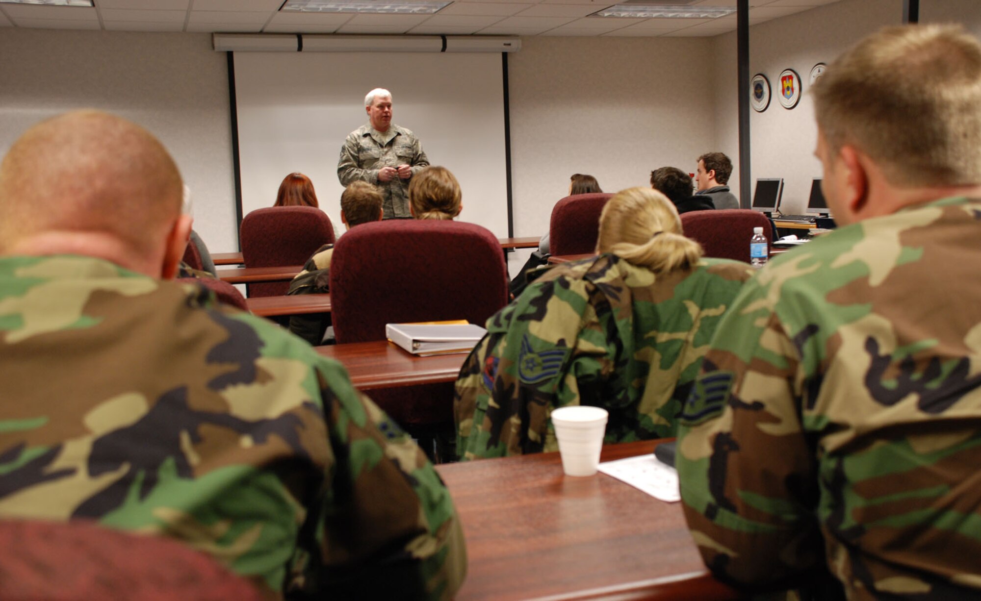 Command Chief Master Sergeant Merle Lyman speaks to University of Illinois students and new Airmen at the 932nd Airlift Wing during the Unit Training Assembly.  Photo/Capt. Stan Paregien
