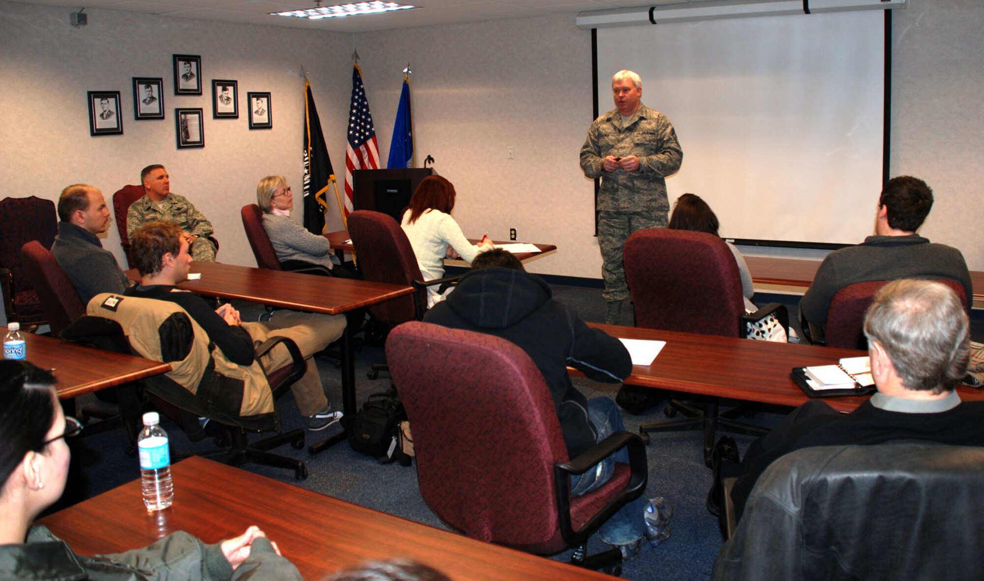 Command Chief Master Sergeant Merle Lyman speaks to University of Illinois graduate students and new Airmen at the 932nd Airlift Wing during the March unit drill.  Photo/Capt. Stan Paregien