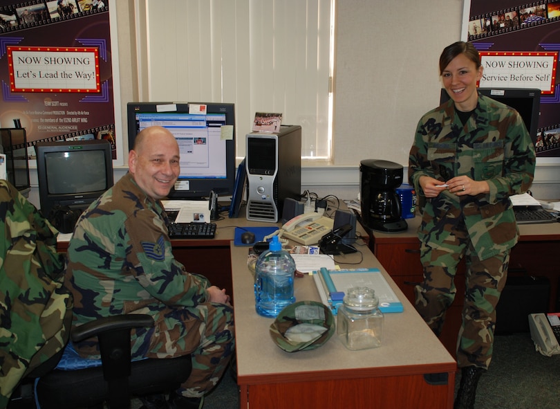 Tech. Sgt. Gerald Sonnenberg, photographer and Gateway newspaper editor, looks for the next opportunity to tell the 932nd Airlift Wing sports story with 1st Lt. Christina Bologna who recently qualified to run in the Boston Marathon.  The 932nd Airlift Wing is an lliniois Air Force Reserve Command unit.  Photo/Capt. Stan Paregien