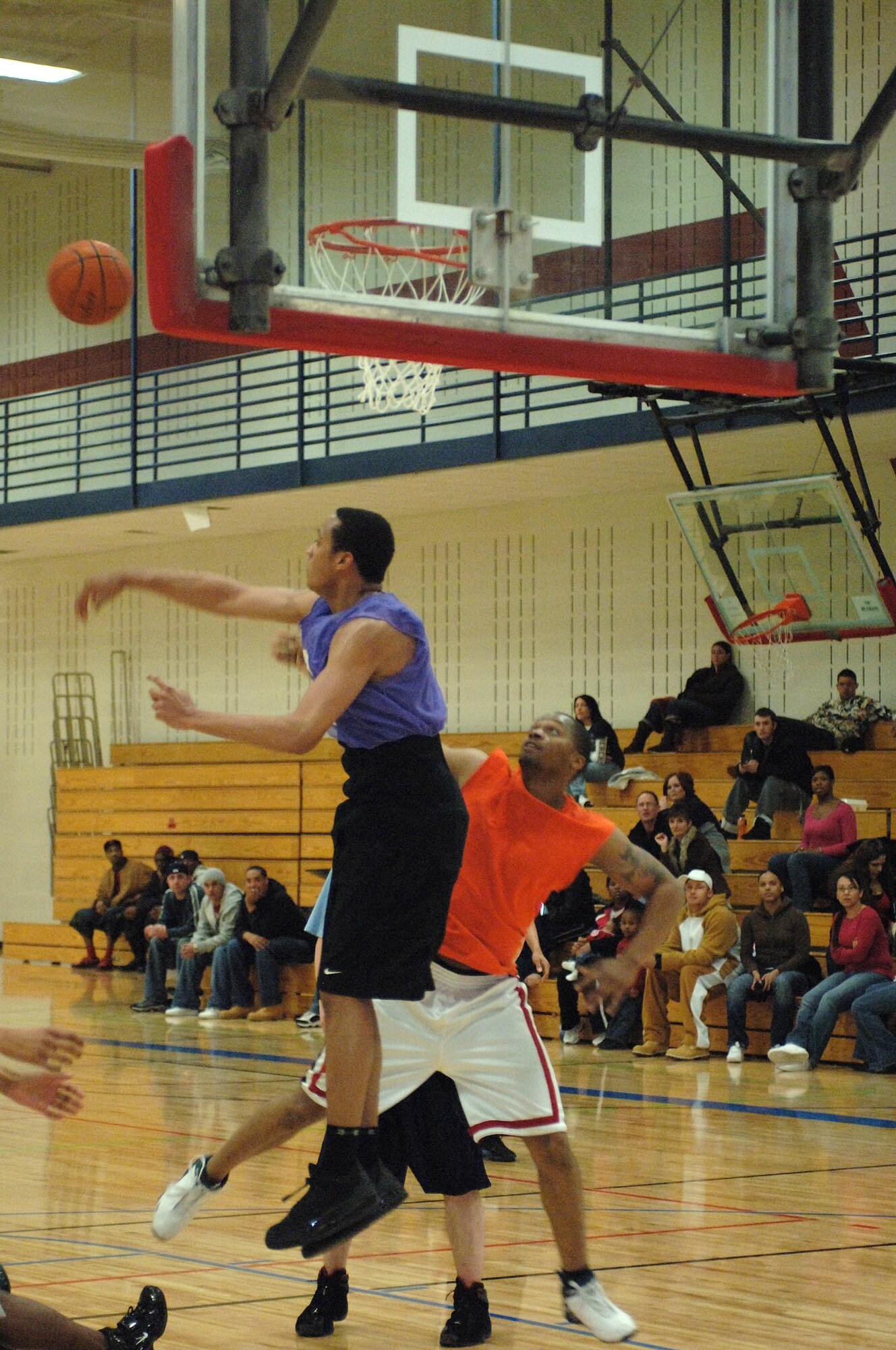 Antonio Sanders, 28th Security Forces Squadron power forward, blocks a 28th Logistics Readiness Squadron shot, in the Ellsworth intramural basketball championship game March 6. The 28 SFS won the championship in overtime with a final score of 79-71. (U.S. Air Force photo by Airman Corey Hook)