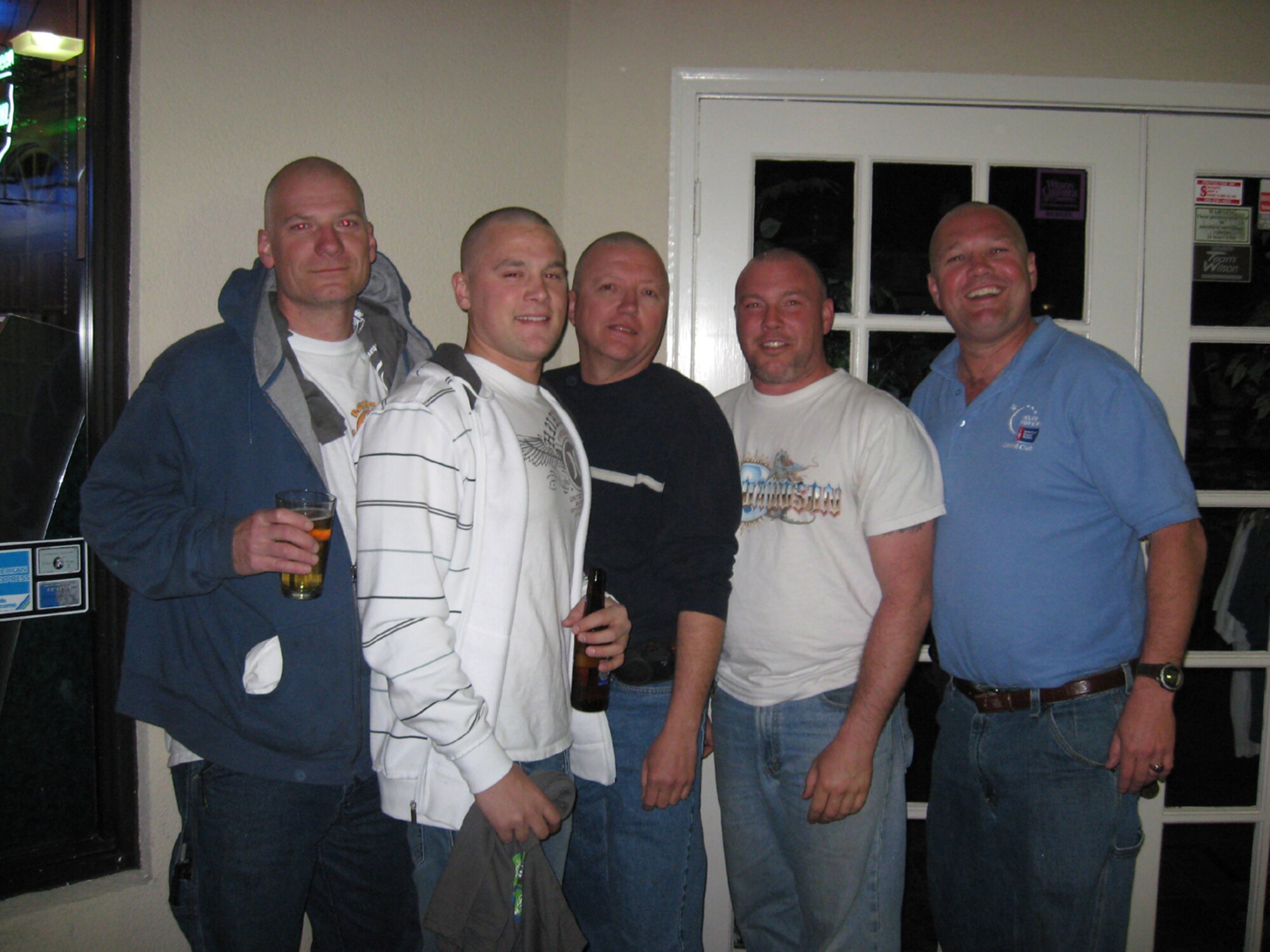 SEYMOUR JOHNSON AIR FORCE BASE, N.C. -- Five reservists with the 916th Maintenance Group sport their new haircuts in the name of charity. From left to right are: Tech. Sgt. Marion Smith, Staff Sgt. Jason LeClair, Staff Sgt. Jackie Lawson, Tech. Sgt. Damien Godshall and Tech. Sgt. Steve Howard. All helped raise money for the St. Baldrick's Foundation which supports research for a cure for children's cancer.