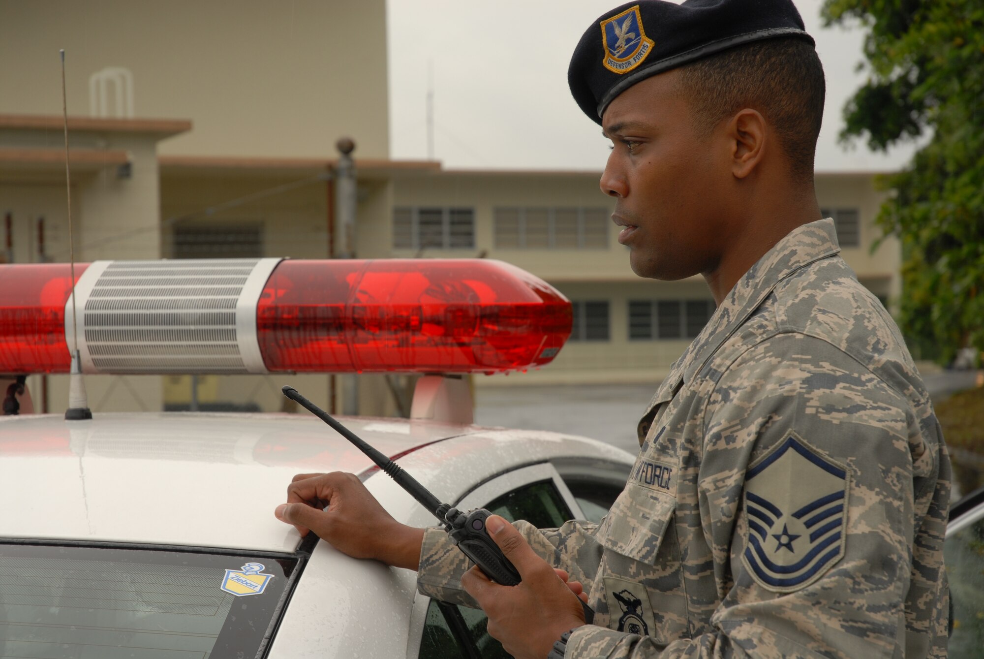 Master Sgt. Anthony Johnson, 18th Security Forces Squadron, awaits the call from the Law Enforcement Desk to determine the next course of action in a hostile situation at the 18th Comptroller Squadron, during the 2008 Pacific Air Forces Operational Readiness Inspection at Kadena Air Base, Japan, March 11, 2008. PACAF is conducting the inspection from March 9 to 15 to validate the mission readiness of the 18th Wing. (U.S. Air Force photo/Staff Sgt. Chrissy FitzGerald)
