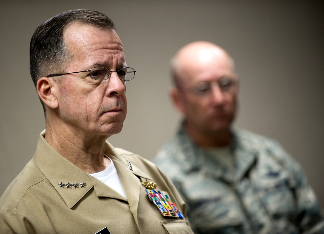 U.S. Navy Adm. Mike Mullen, chairman of the Joint Chiefs of Staff, and Gen. Gene Renuart, commander, Northern Command, answer questions during a media availability, Peterson Air Force Base, Colo., March 10, 2008. 
