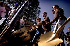 Fifth-graders from Westview Elementary School in Goose Creek plant a tree during the Earth Day celebration on base Wednesday. More than 700 students came to the base's 12th Earth Day celebration. (U.S. Air Force photo/Senior Airman Nicholas Pilch)