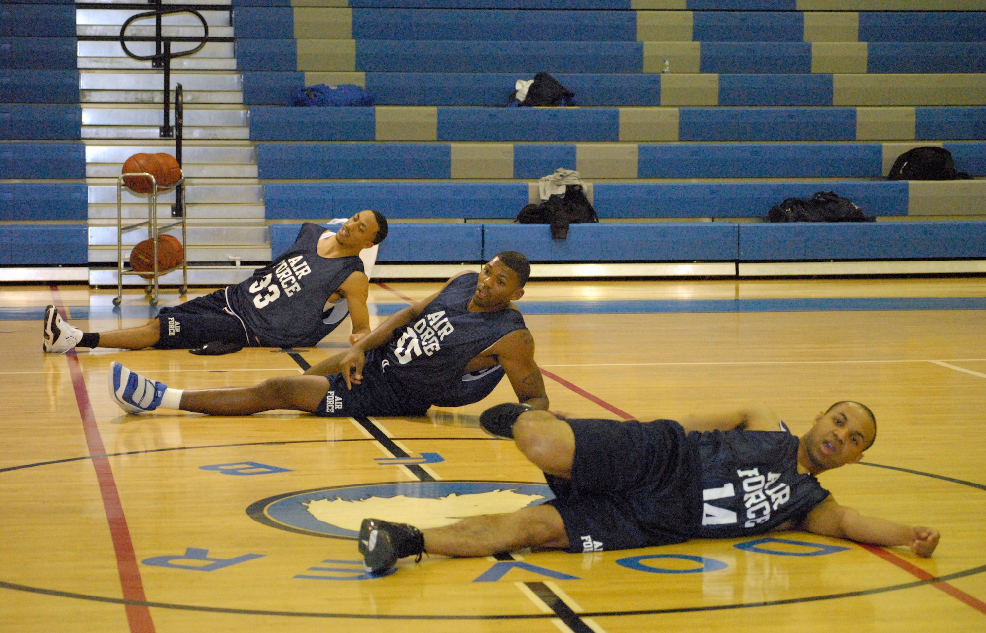 Nineteen Airmen throughout the Air Force gathered at the Dover Air Force Base Fitness Center March 5 to stretch out before a scrimmage. They’re competing to earn a coveted spot on the All-Air Force Basketball team. (U.S. Air Force photo/Airman 1st Class Shen-Chia Chu)