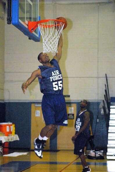 Cover photo: Airman 1st Class James Watts, from Hill Air Force Base, Utah, makes a dunk during a warm-up at the All-Air Force Basketball try-outs at the Dover AFB Fitness Center March 5. Airmen from throughout the Air Force are competing through March 19 for a coveted spot on the team. (U.S. Air Force photo/Airman 1st Class Shen-Chia Chu)